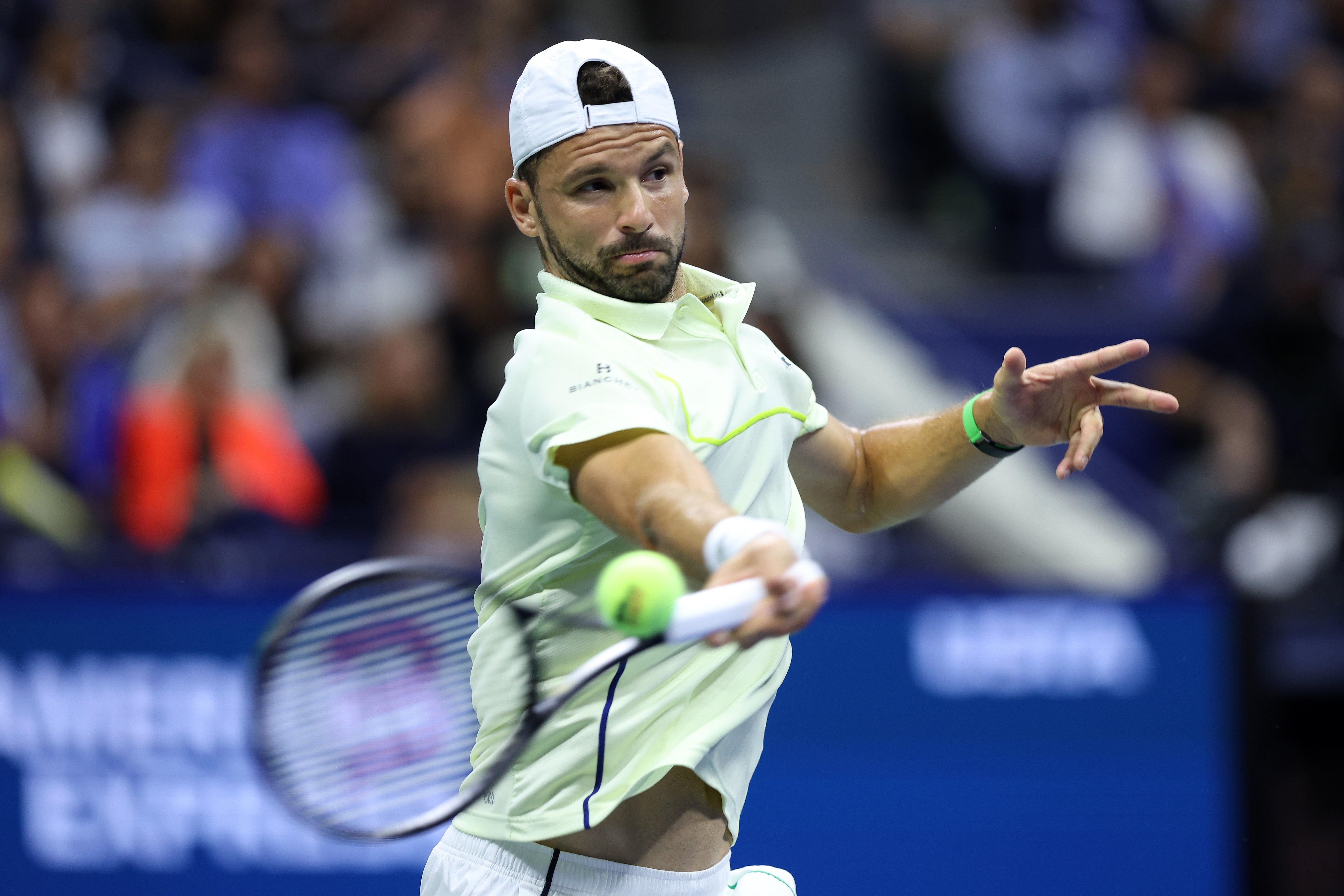 Grigor Dimitrov of Bulgaria defeats Frances Tiafoe of the USA during their men's singles quarterfinal match on Day 9