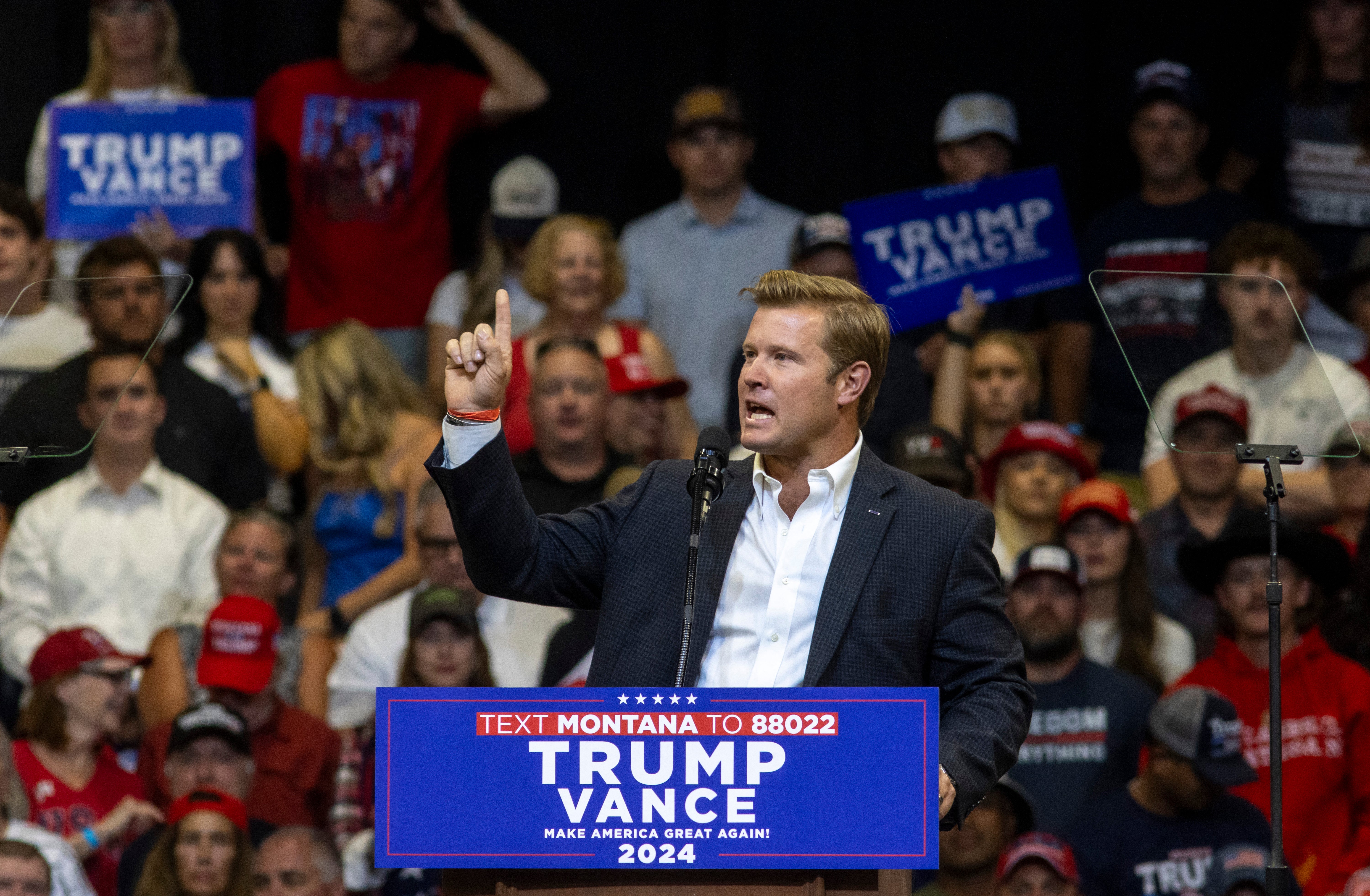 Republican candidate for US Senator, Tim Sheehy, speaks at a rally supporting Donald Trump.