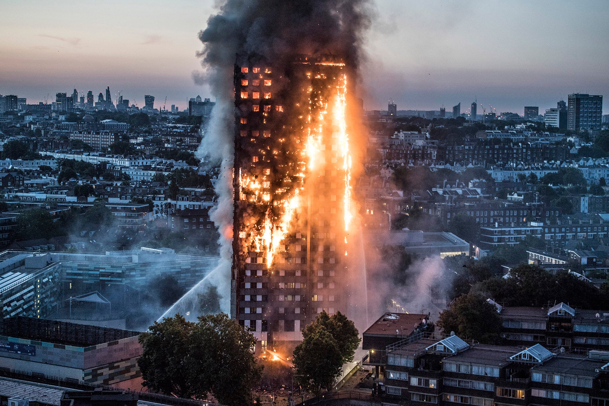 The tower block fire spread with many residents still trapped inside