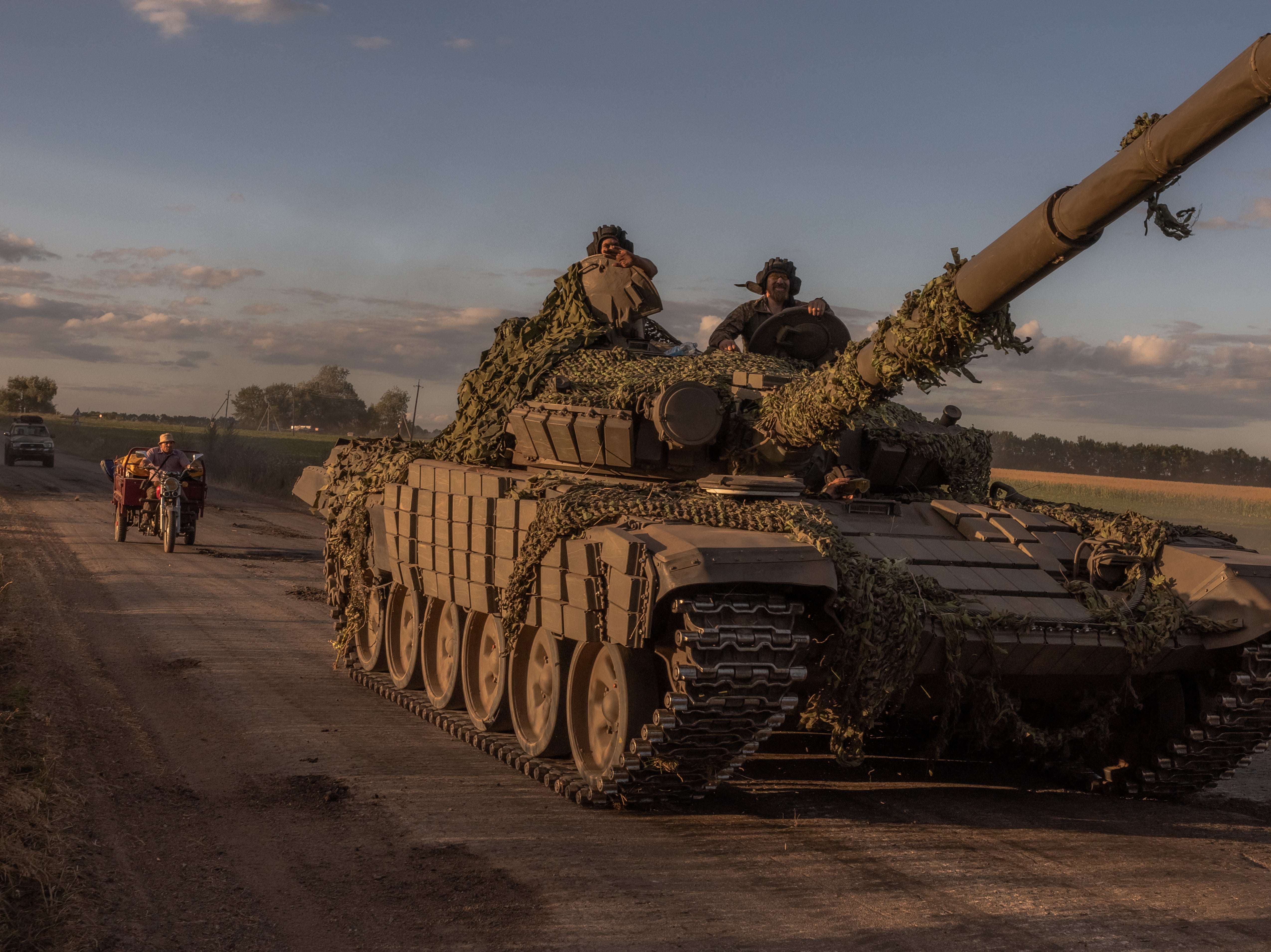 Ukrainian servicemen operate a Soviet-made T-72 tank in the Sumy region, near the border with Russia