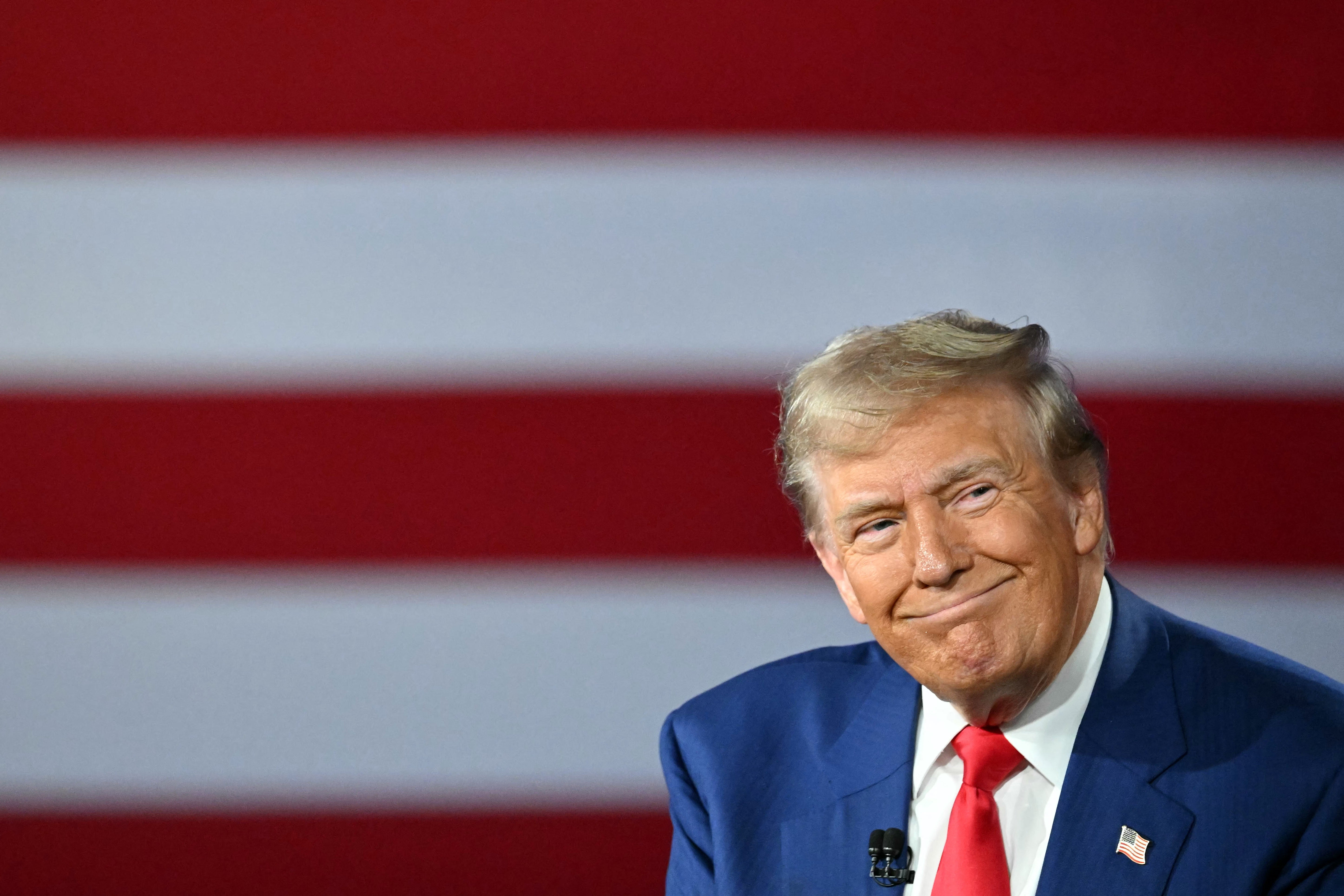 Donald Trump takes part in a town hall moderated by Fox News broadcaster Sean Hannity at the New Holland Arena in Harrisburg, Pennsylvania, on September 4