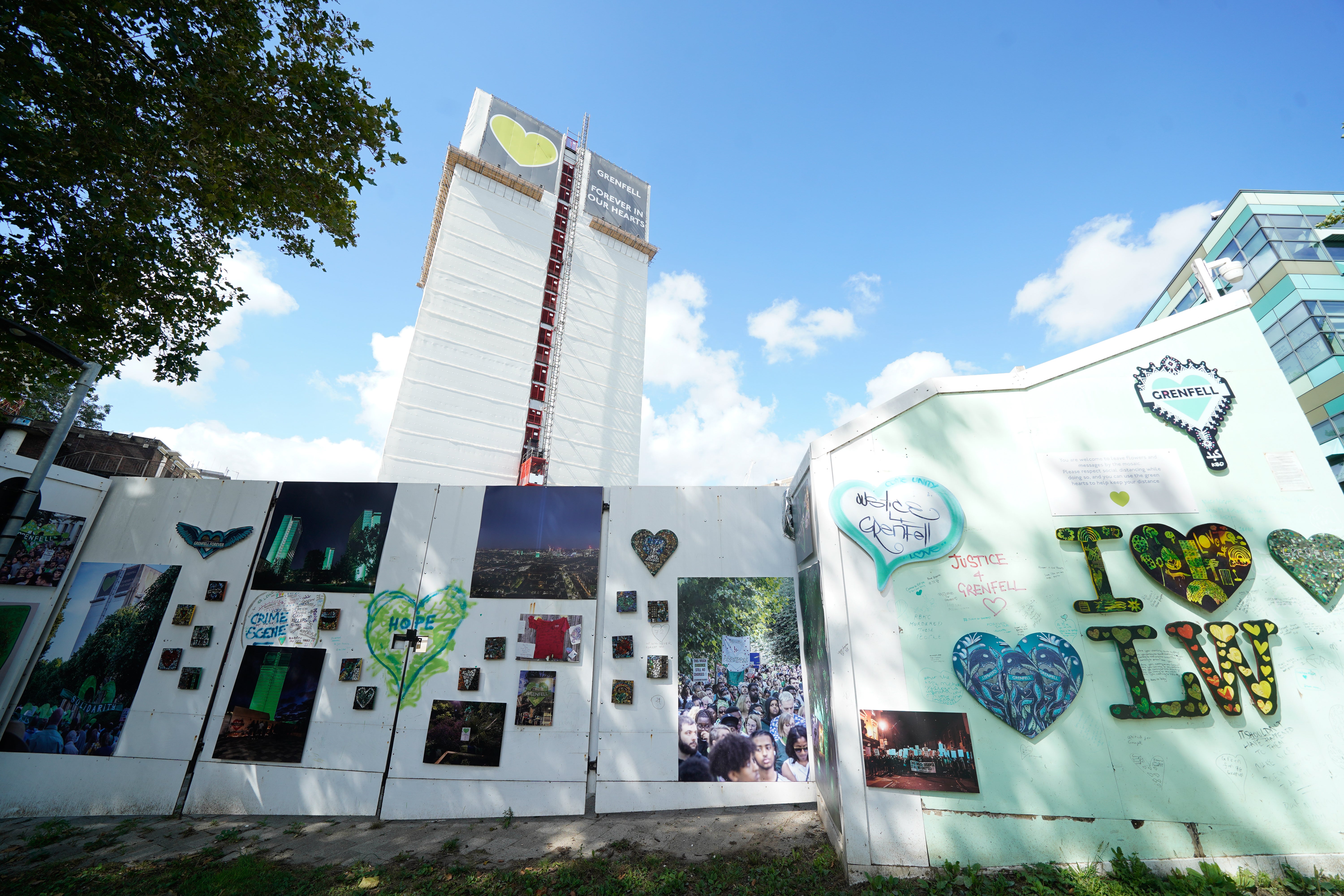 The Grenfell Memorial Wall in west London in the shadow of the tower block