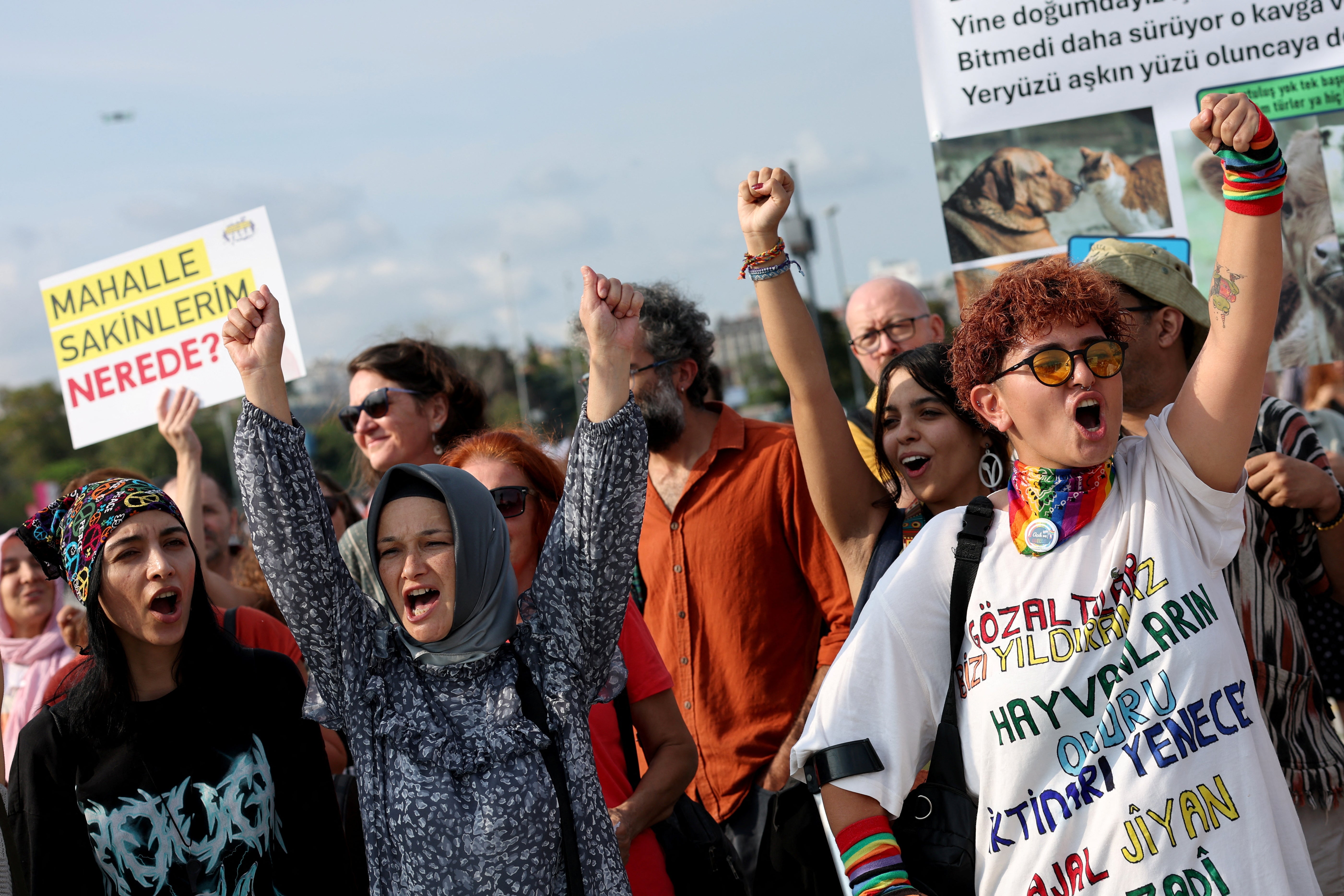 Animal rights activists take part in a rally to protest against the law