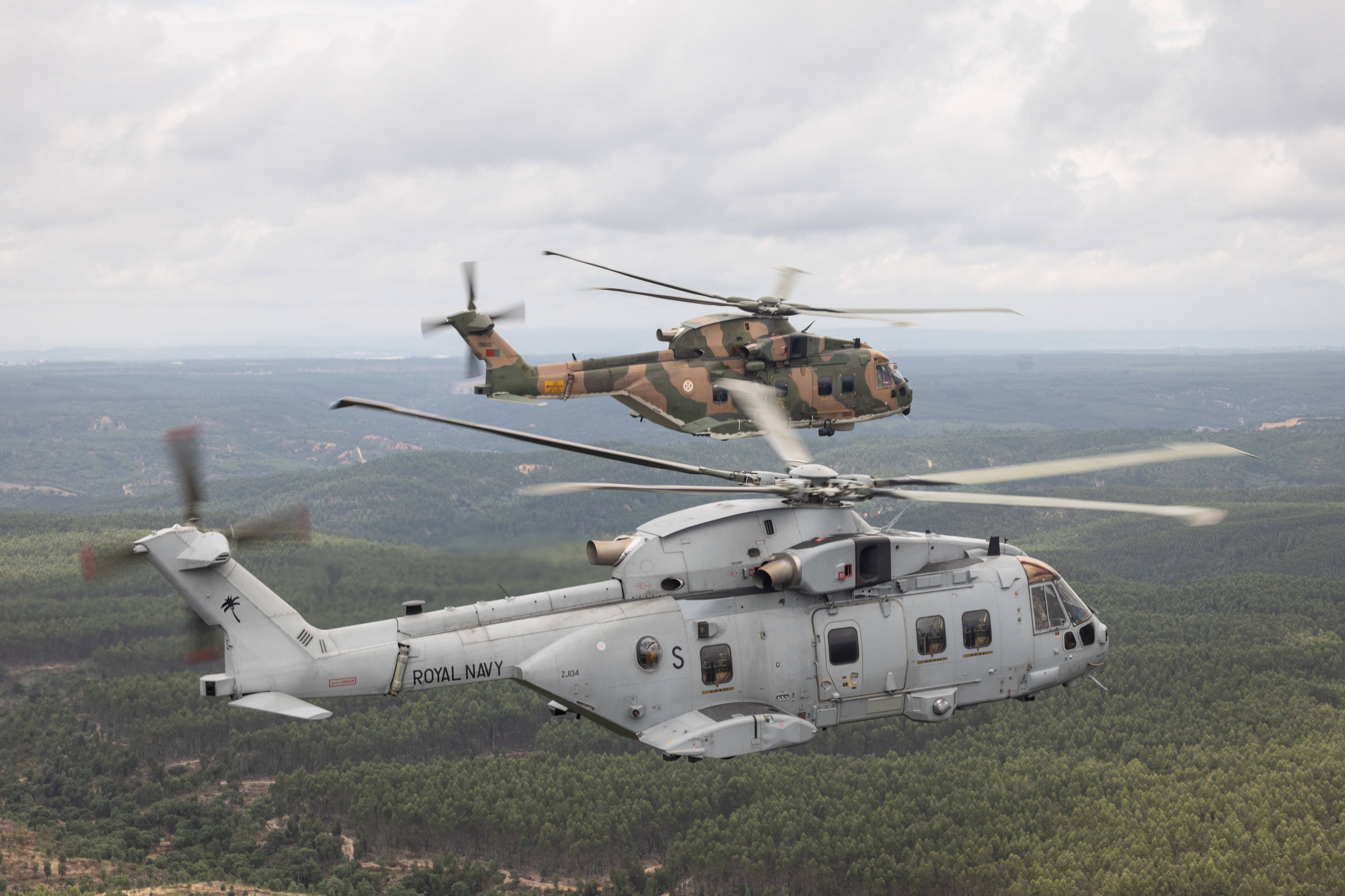 Merlin of 751 Esquadra, top, and a Merlin Mk 4, bottom, flying over Lisbon