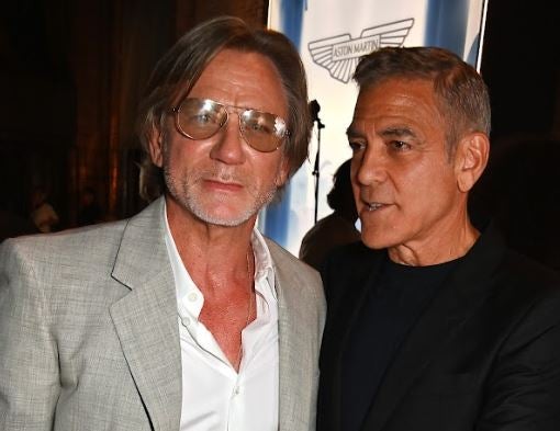 Daniel Craig and George Clooney fell for the glamorous star in Venice