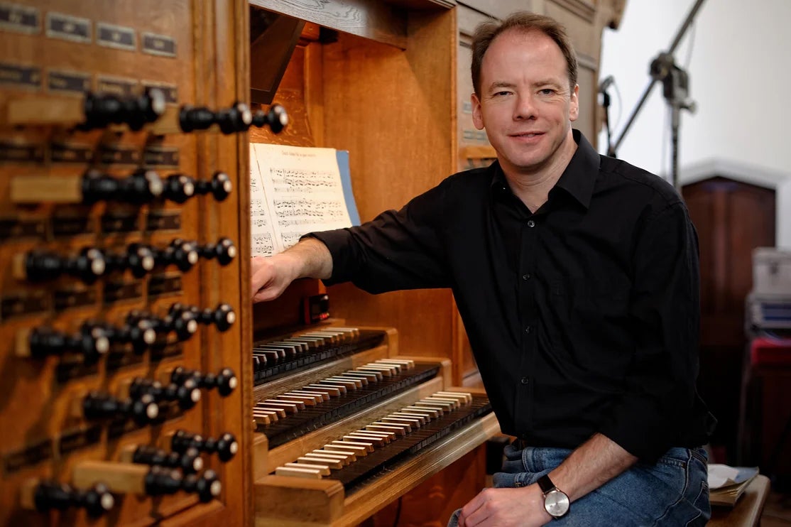 David Goode, organist and music teacher at Eton College, has been banned from teaching for life for searching for inappropriate material