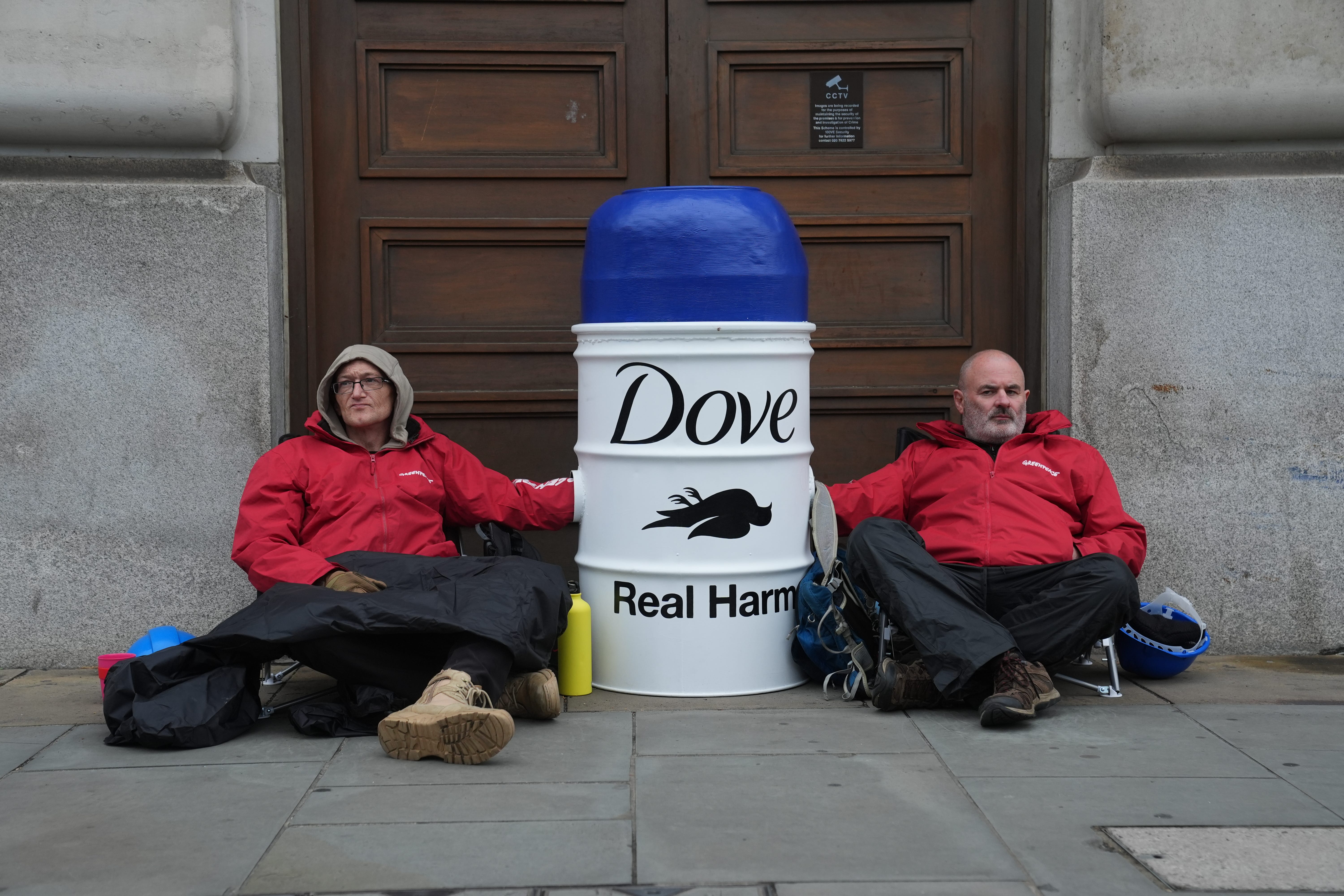 Activists outside Unilever’s headquarters in central London (Lucy North/PA)