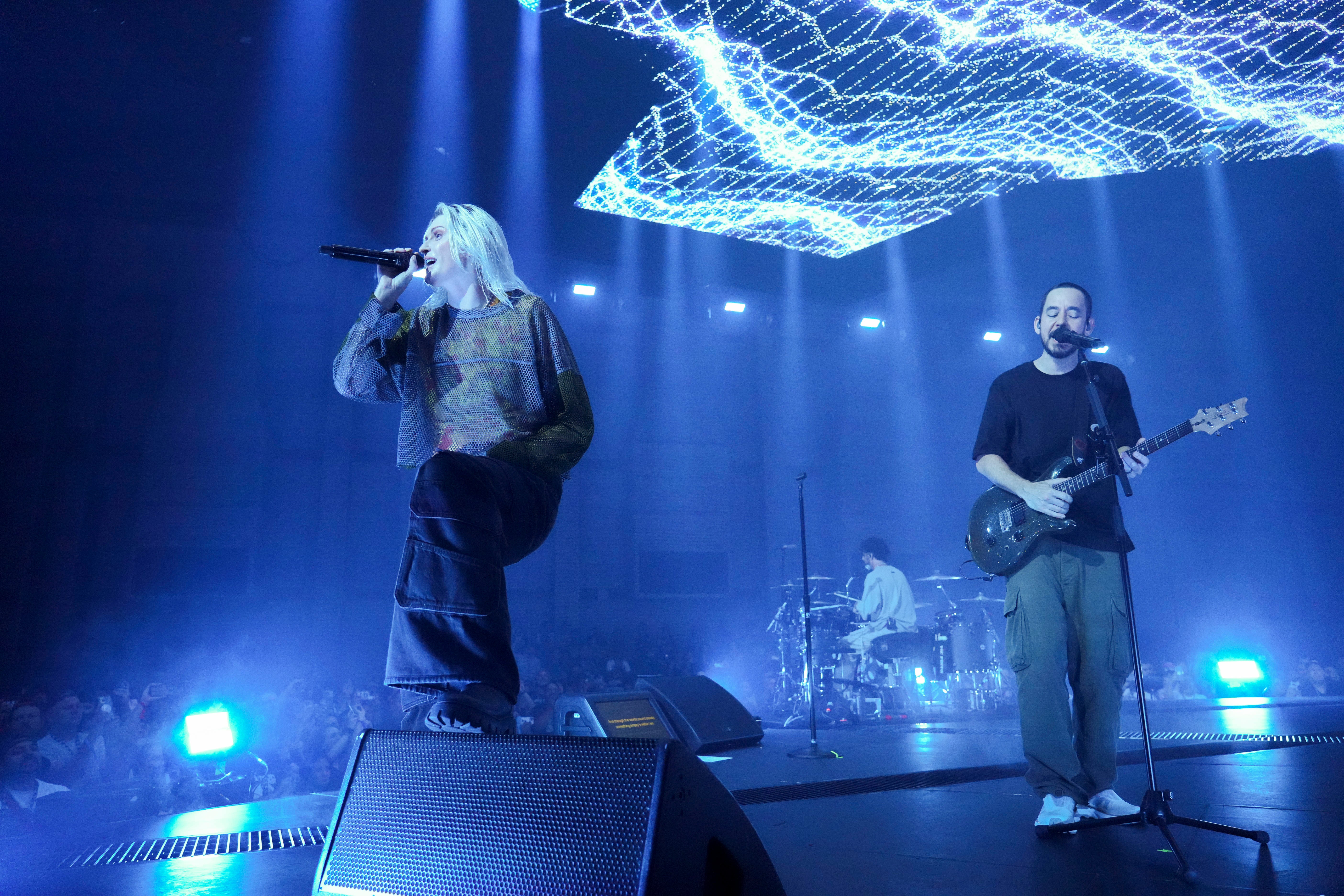 Emily Armstrong, left, Colin Brittain and Mike Shinoda of Linkin Park