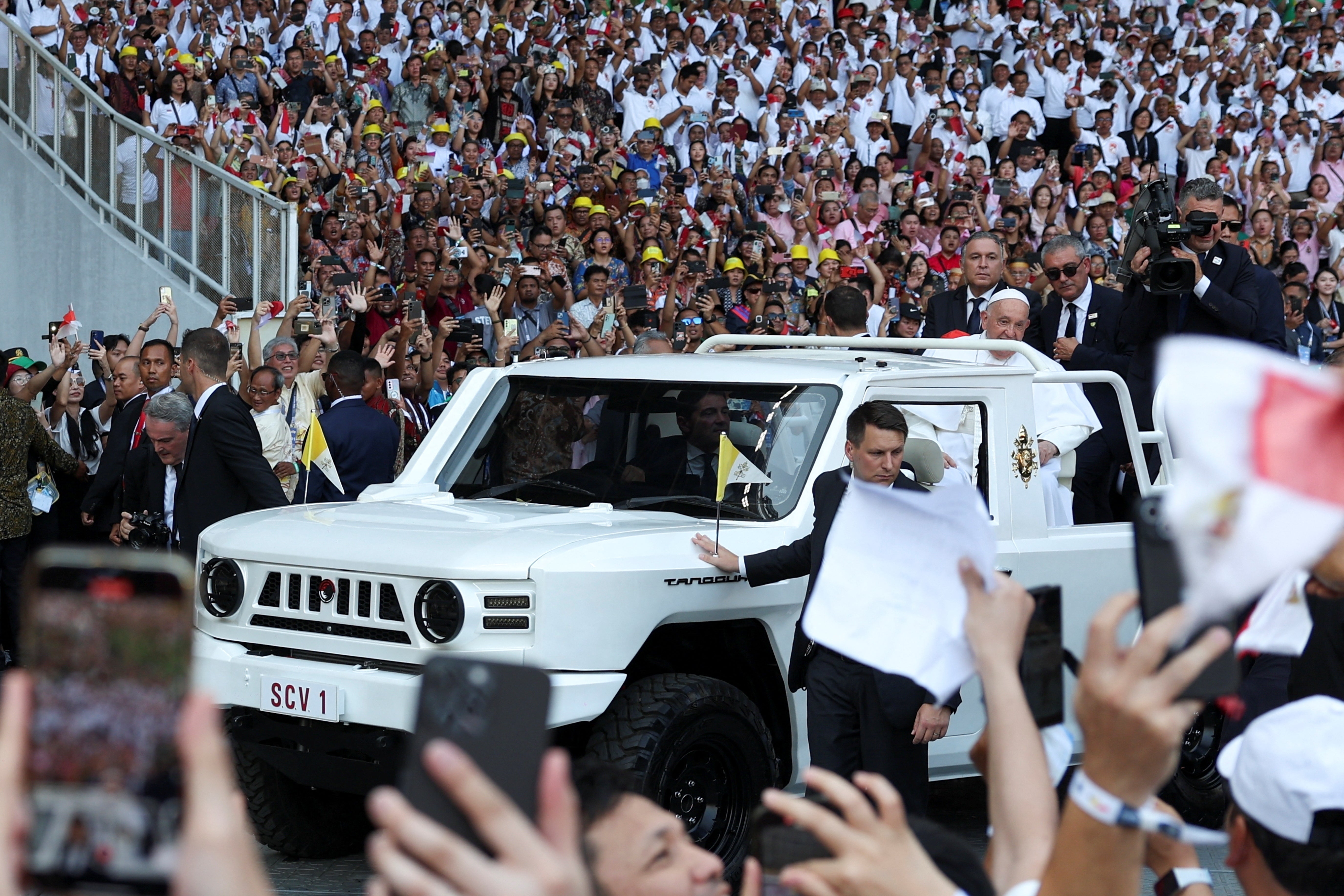 Pope travelled in a family car during the Indonesia tour but was given a custom-made, high-security car for his Mass that was expected to draw 80,000 people