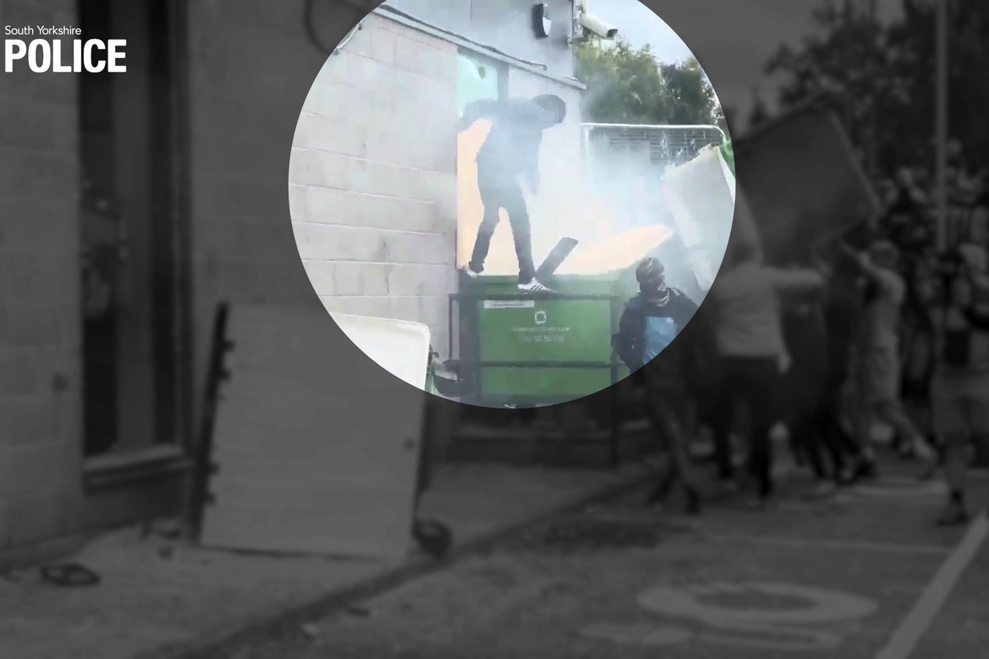 A still from video footage shows painter and decorator Thomas Birley rioting outside the Holiday Inn Express, at Manvers, Rotherham, on 4 August