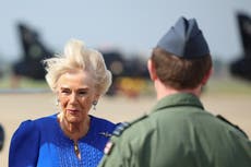 Windy welcome for Camilla as she visits allotment on air base