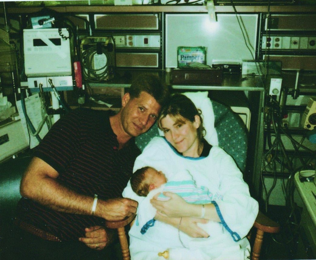 Fred and his wife, Lisa, pose with their son in the NICU in 1999; William began suffering seizures 18 hours after birth and sparked his father’s turn as a dedicated disability rights advocate