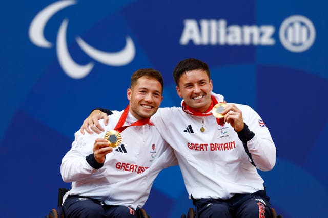 <p>Great Britain’s Alfie Hewett and Gordon Reid pose with their gold medals.</p>