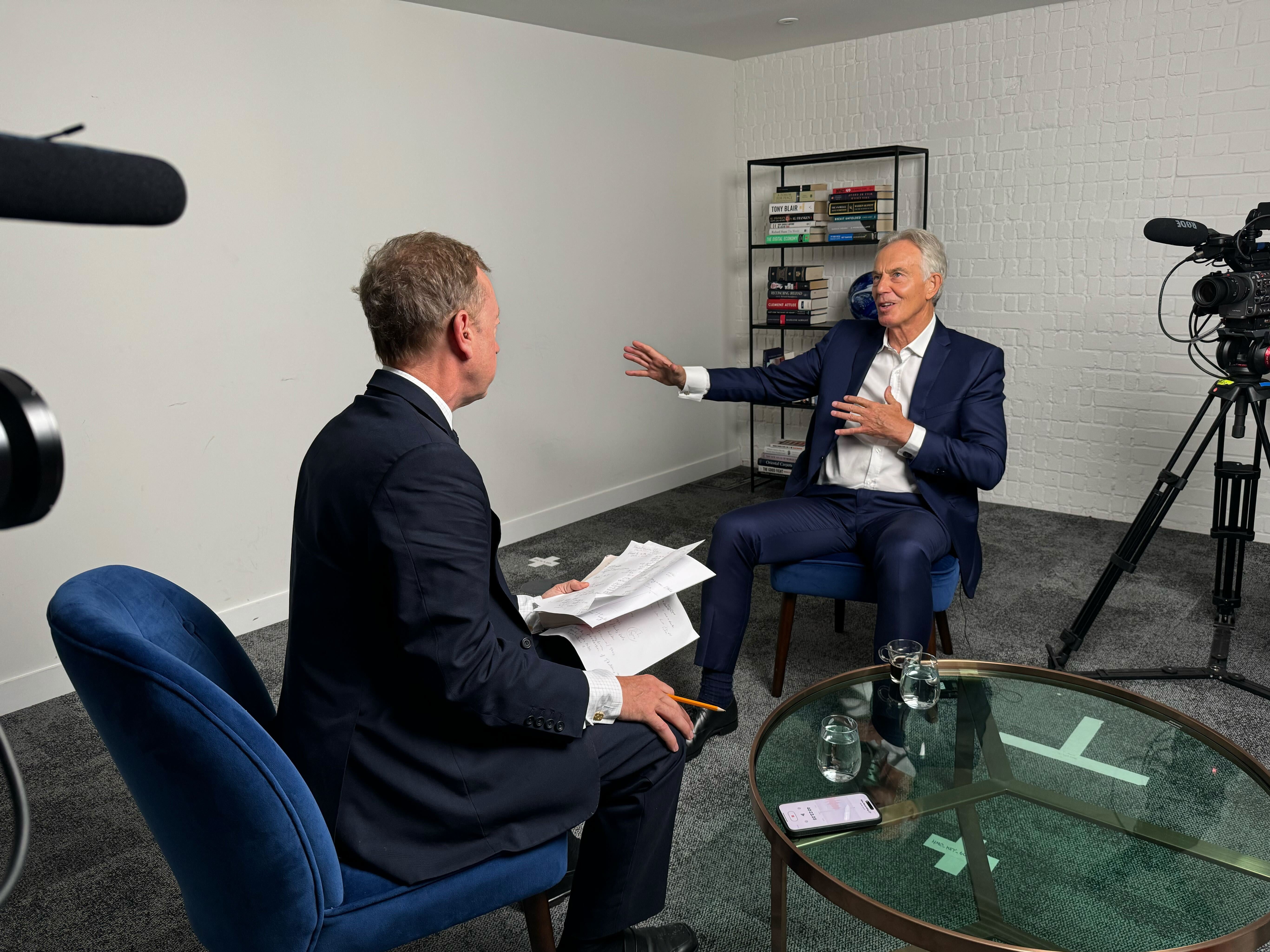 Former PM Tony Blair is interviewed by editor-in-chief Geordie Greig for Independent TV