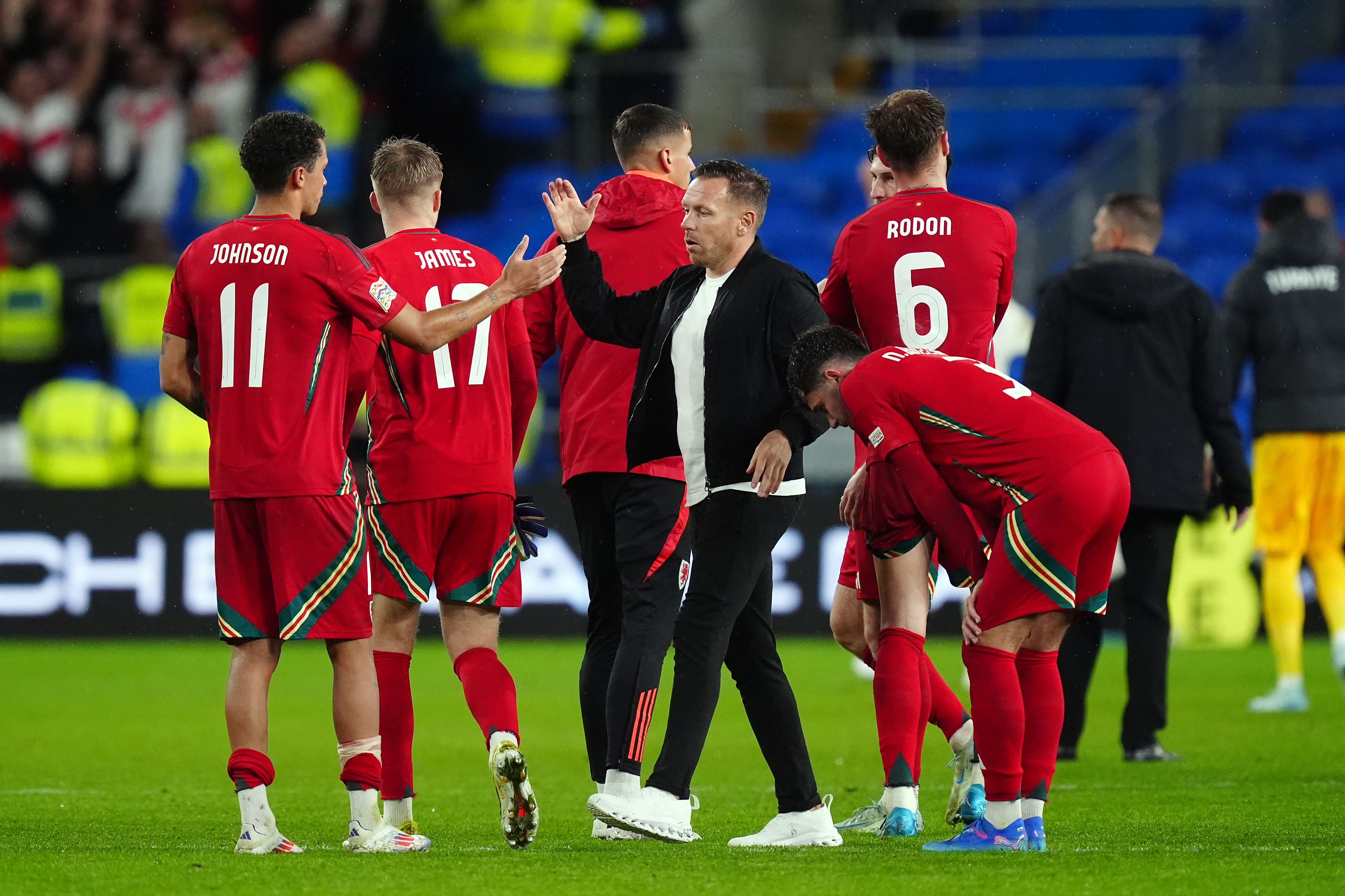 Wales manager Craig Bellamy congratulates his players after their 0-0 draw against Turkey (David Davies/PA)