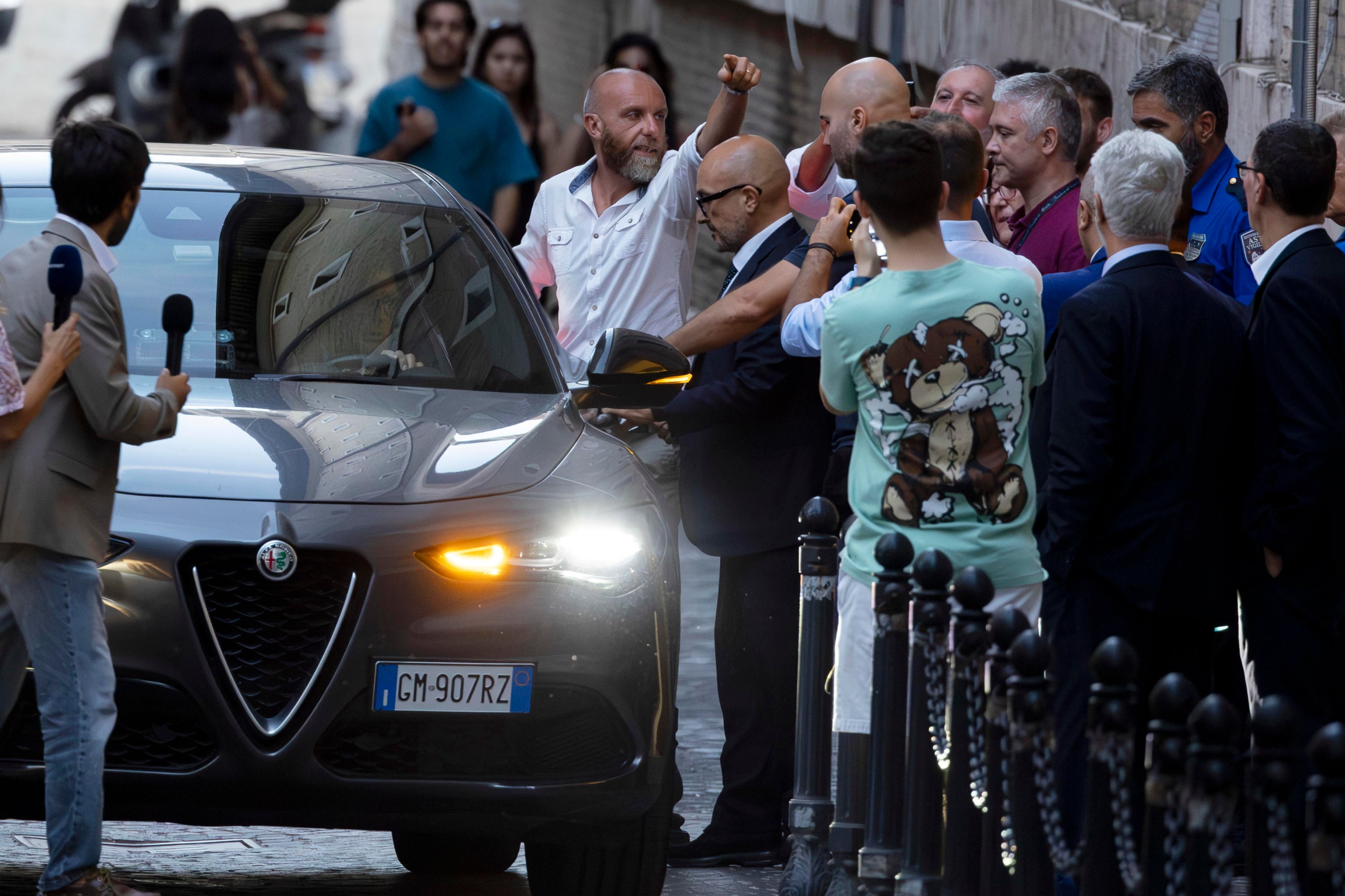 Gennaro Sangiuliano (C) leaves the ministry, in Rome, Italy, on Friday after tendering his resignation