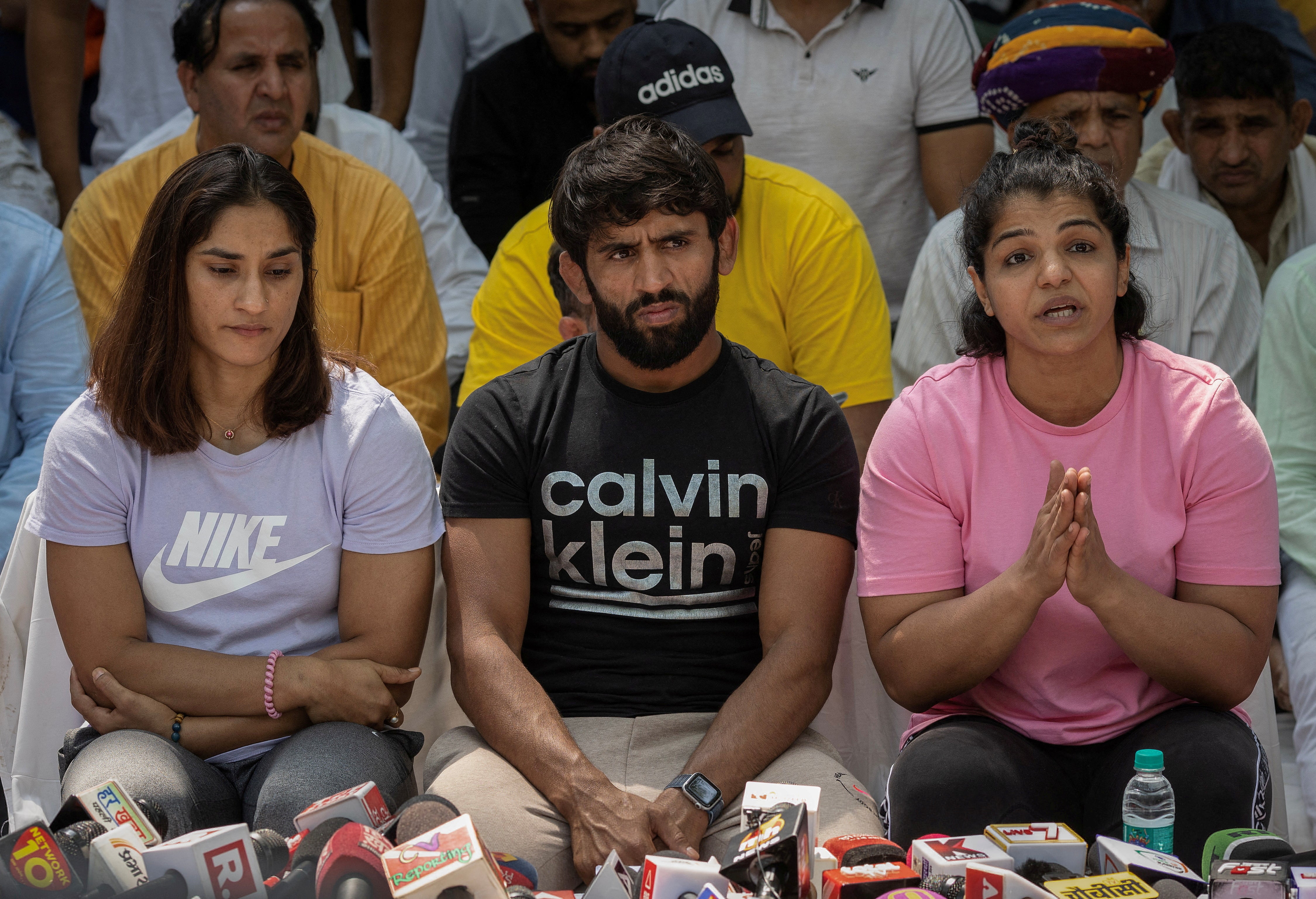 File: Indian wrestlers take part in a sit-in protest demanding arrest of WFI chief, who they accuse of sexually harassing female players, in New Delhi