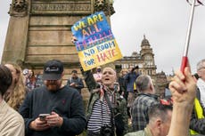 Thousands turn out to oppose Tommy Robinson-backed ‘Pro-UK’ rally