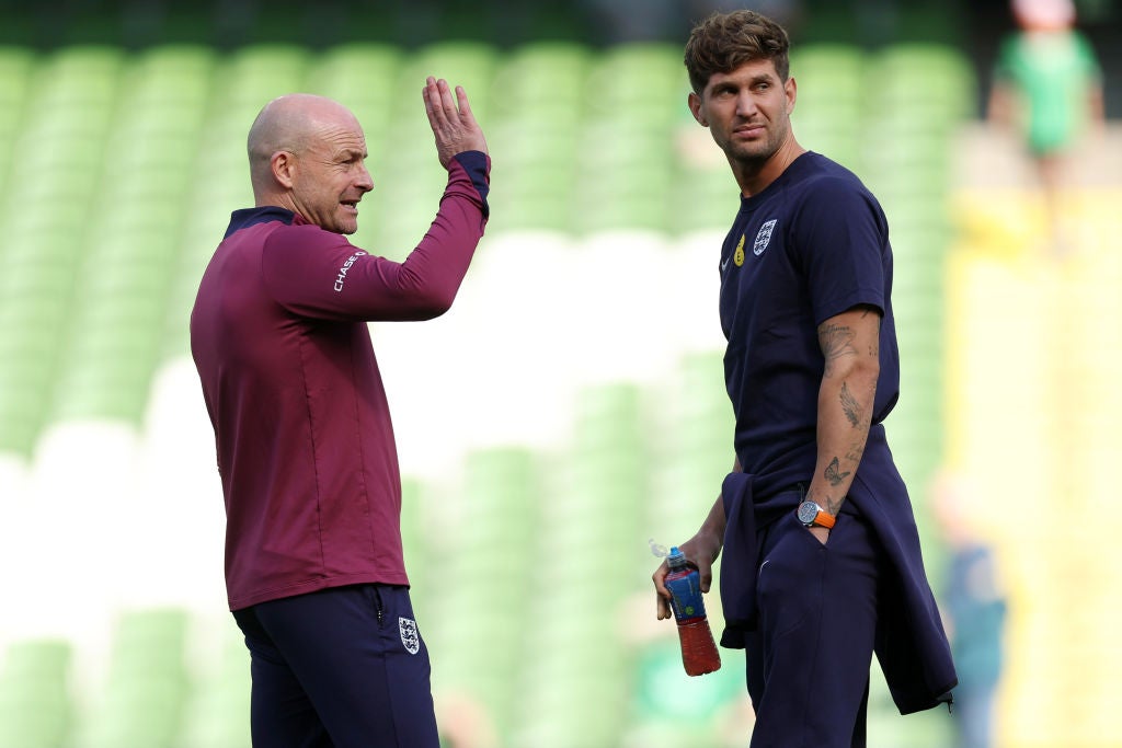 Stones in conversation with England’s interim manager Lee Carsley