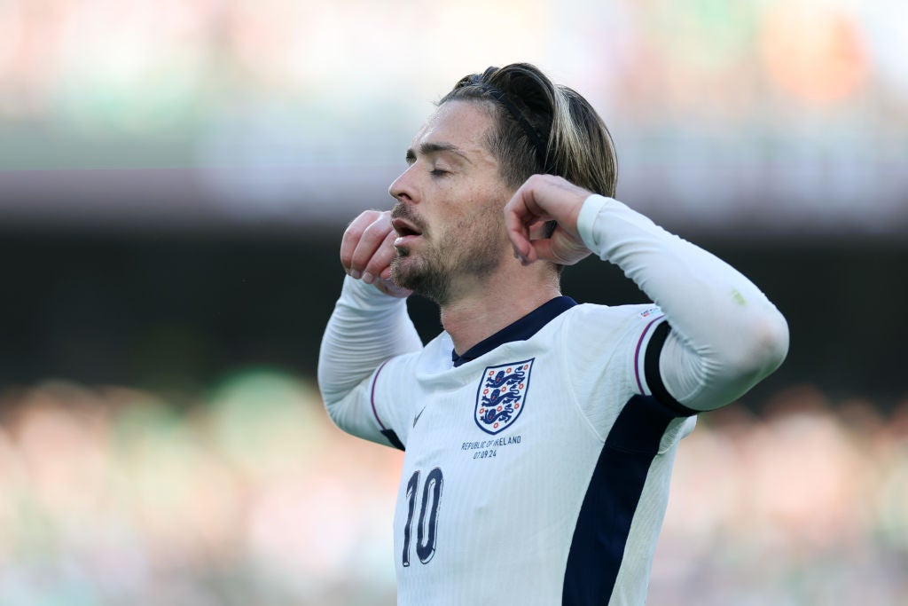 Grealish celebrated by blocking out the noise inside the stadium