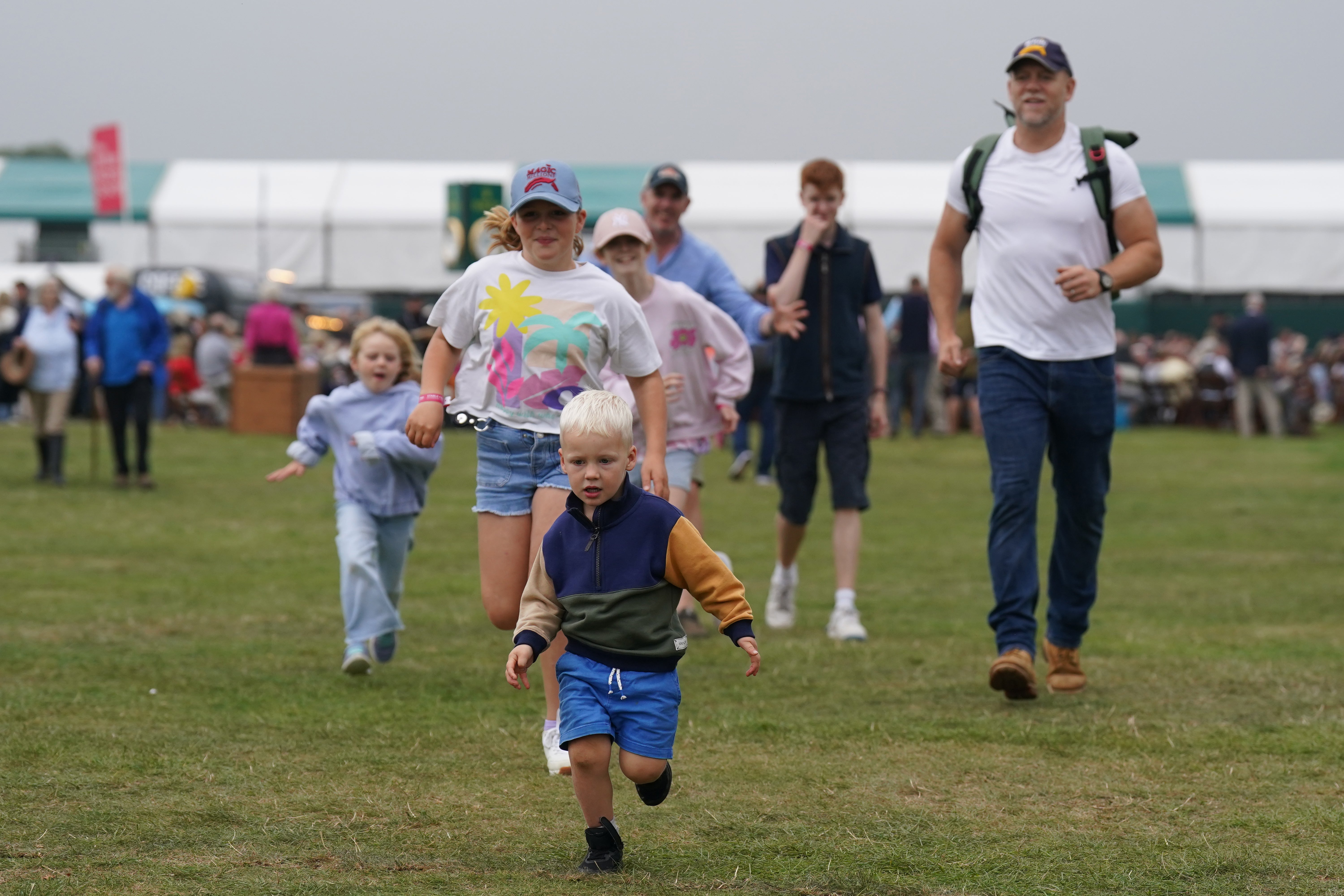 Mike and Zara Tindall track their daughter Mia, 10, with an AirTag attached to her shorts