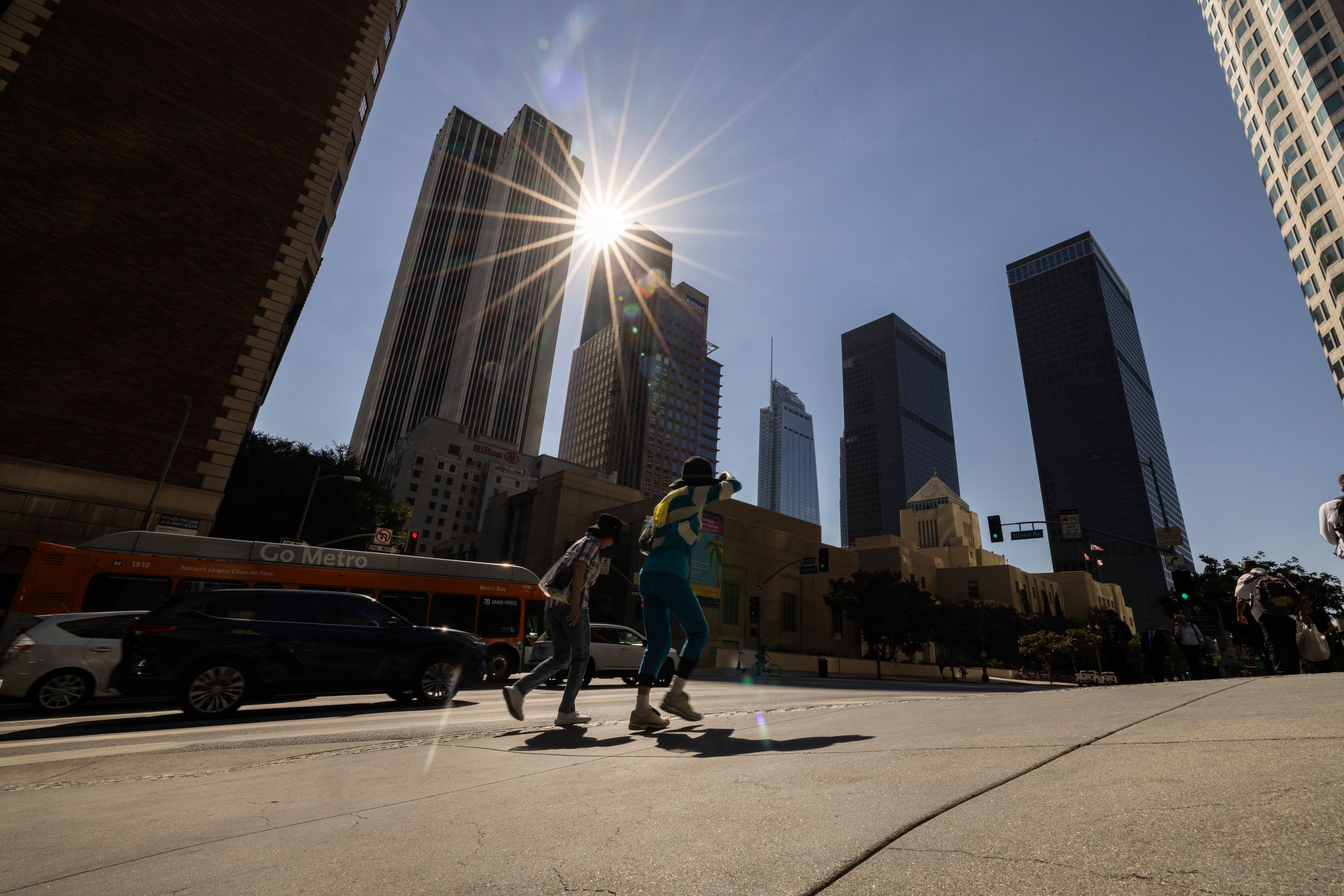 The sun shines over the financial district towers of downtown Los Angeles as Southern California is hit by a heatwave Friday, Sept. 6, 2024, in Los Angeles