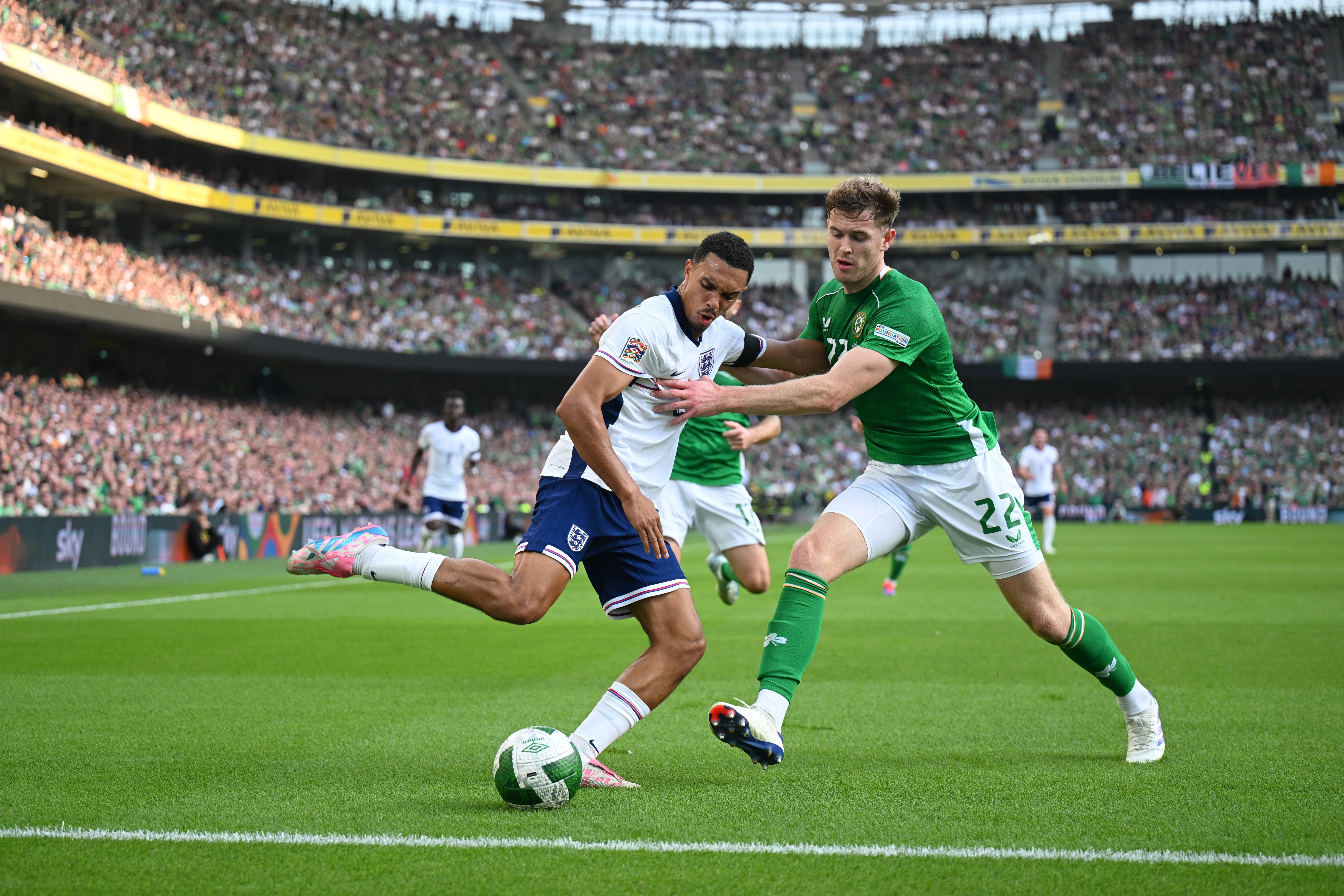 Trent Alexander-Arnold is pressurised by Ireland’s Nathan Collins