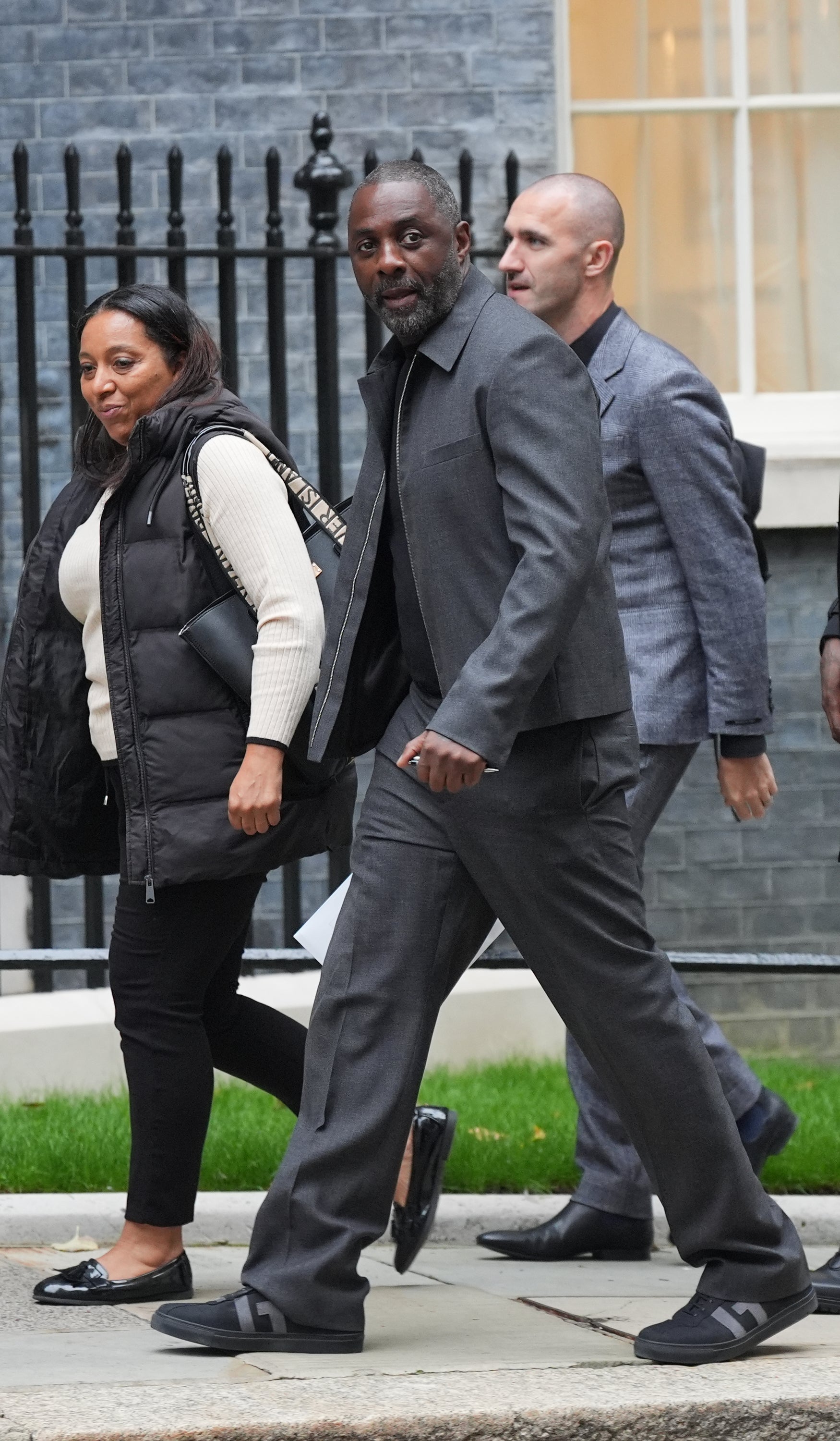 Idris Elba (centre) arrives to attend a knife crime summit hosted by Prime Minister Sir Keir Starmer at 10 Downing Street (Yui Mok/PA)