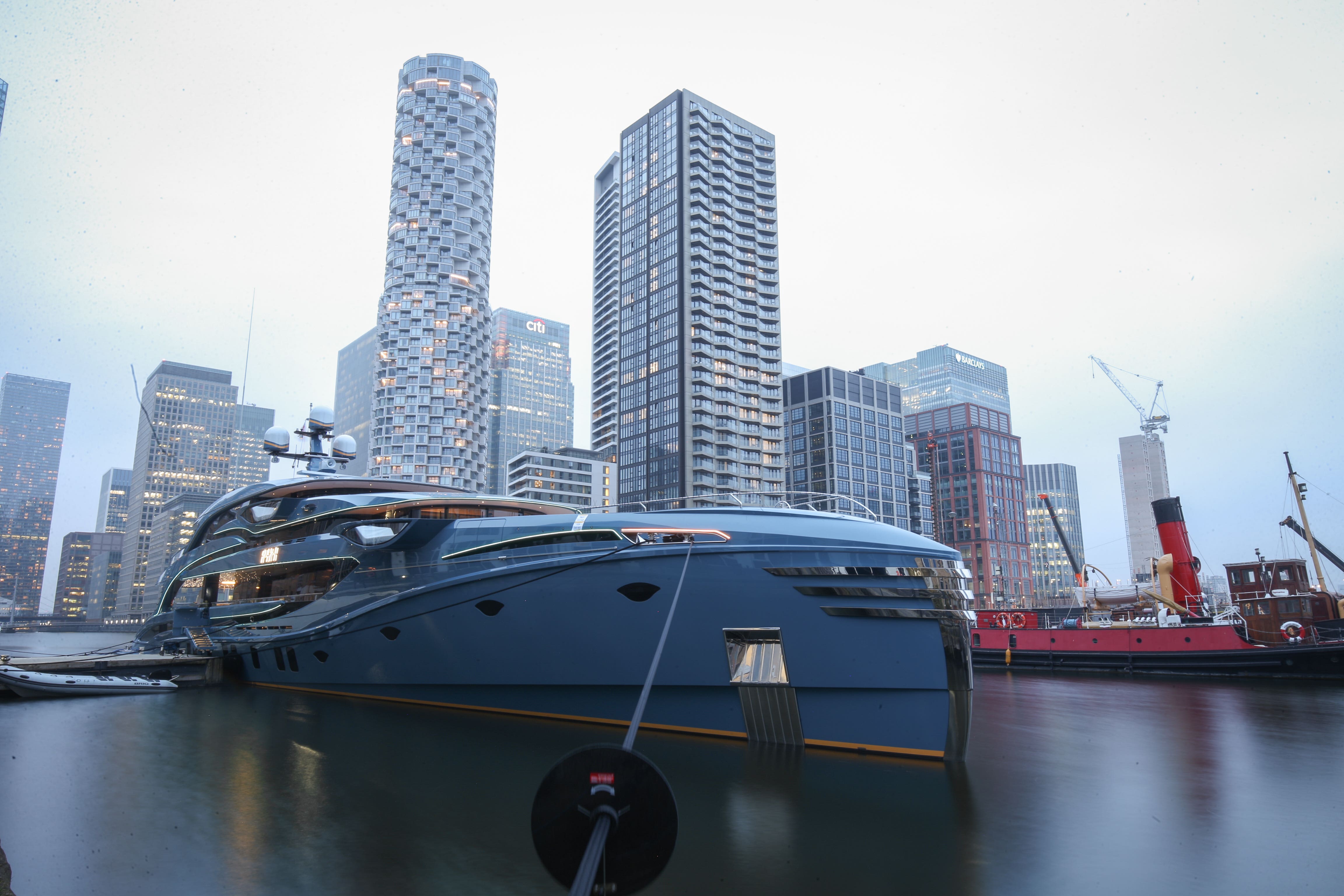 The superyacht Phi owned by a Russian businessman in Canary Wharf, east London which has been detained as part of sanctions against Russia (James Manning/PA)