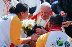 Pope heads to economic power Singapore after a joyous visit to impoverished, devout East Timor