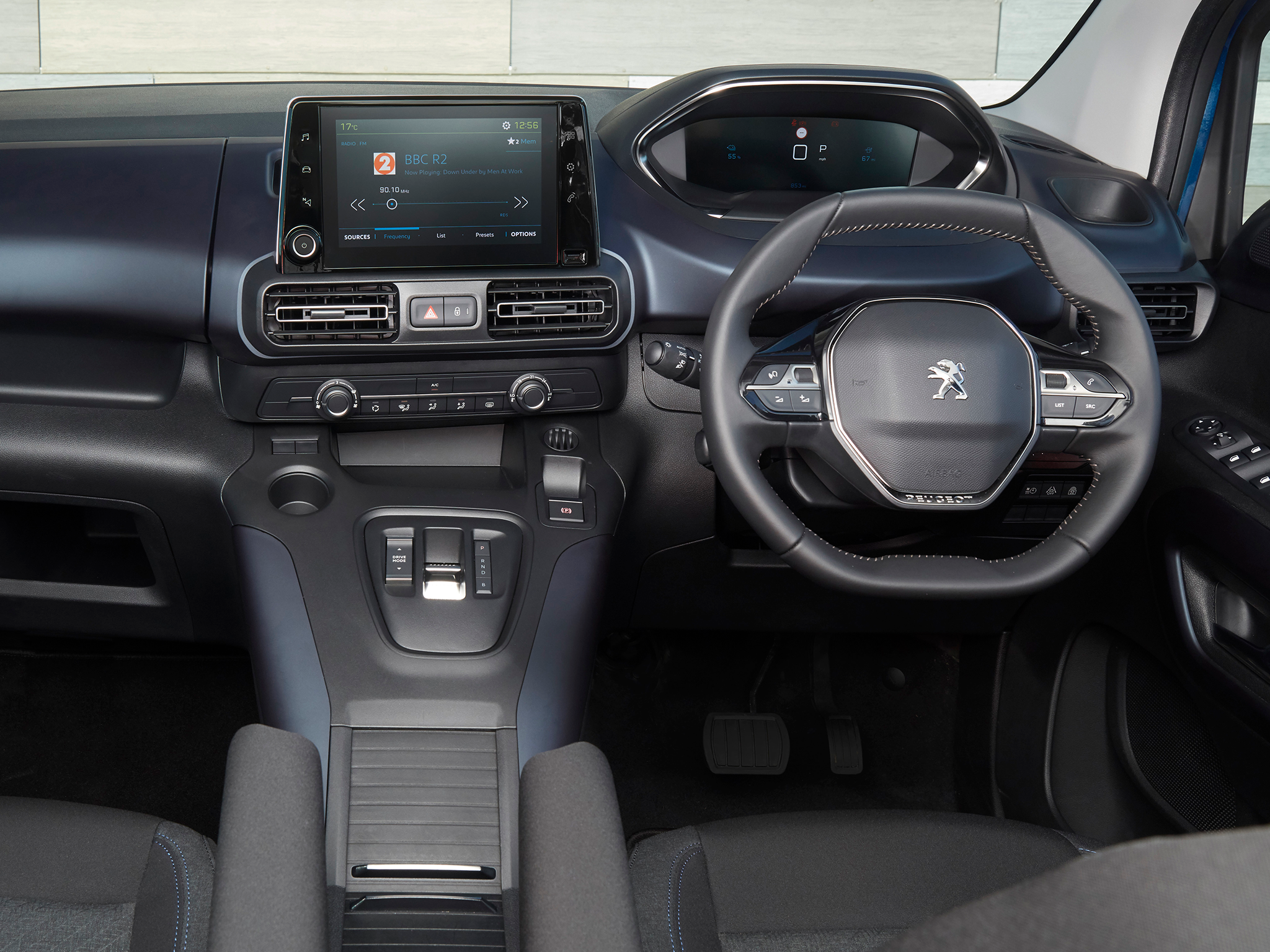 Inside, the Peugeot e-Rifter offers a commanding driving position and plenty of storage space.