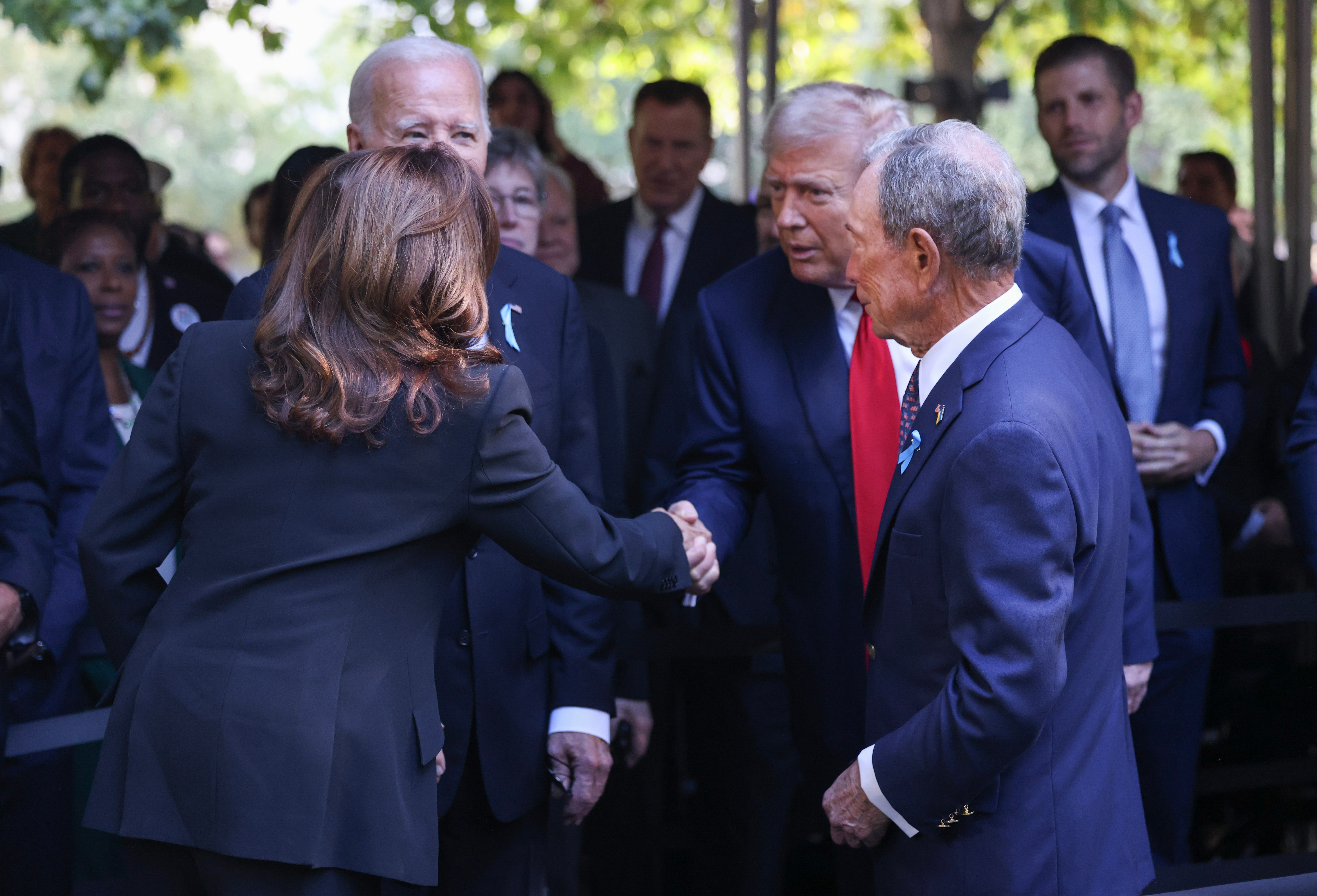 Democratic presidential nominee, U.S. Vice President Kamala Harris, greets Republican presidential nominee, former U.S. President Donald Trump at Ground Zero on September 11, 2024 in New York City