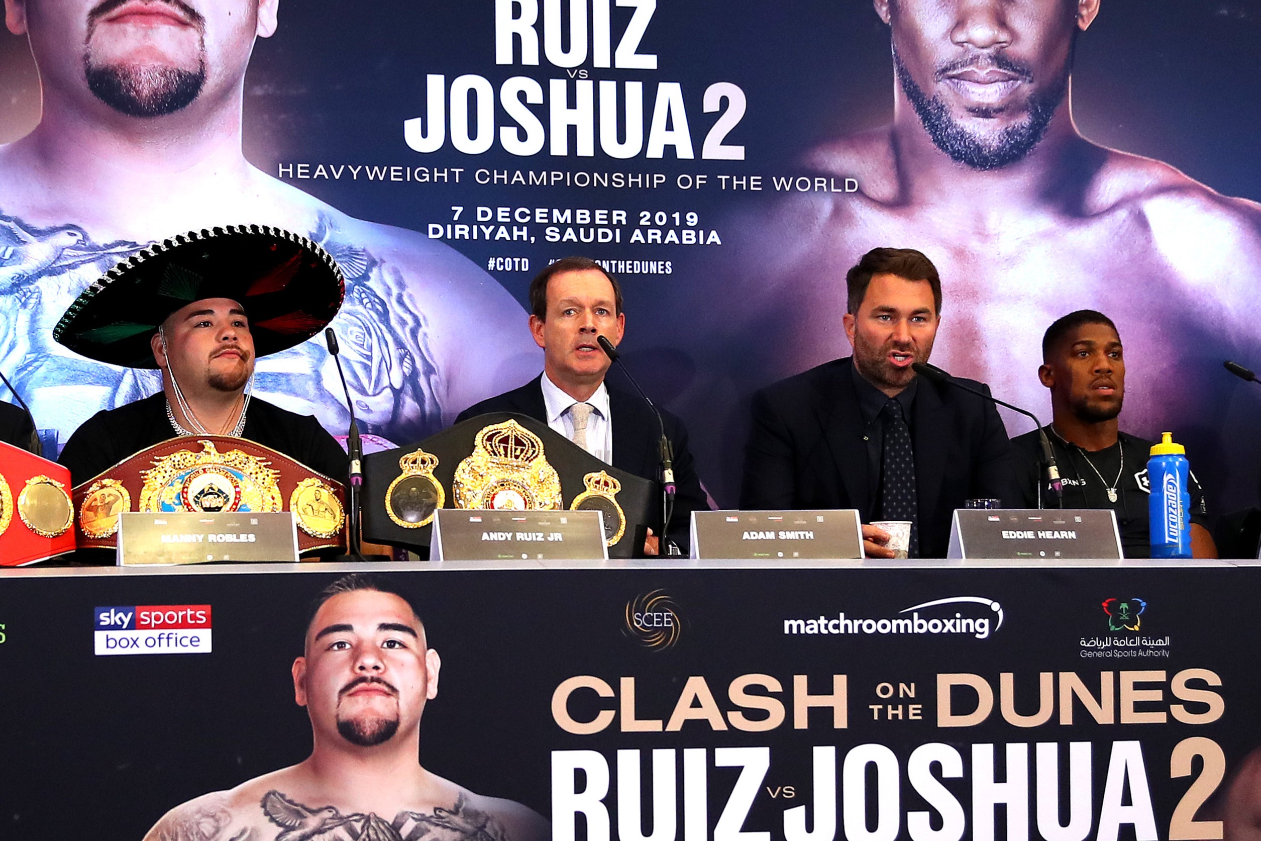 Smith hosting a press conference for Anthony Joshua (right) vs Andy Ruiz 2 in 2019