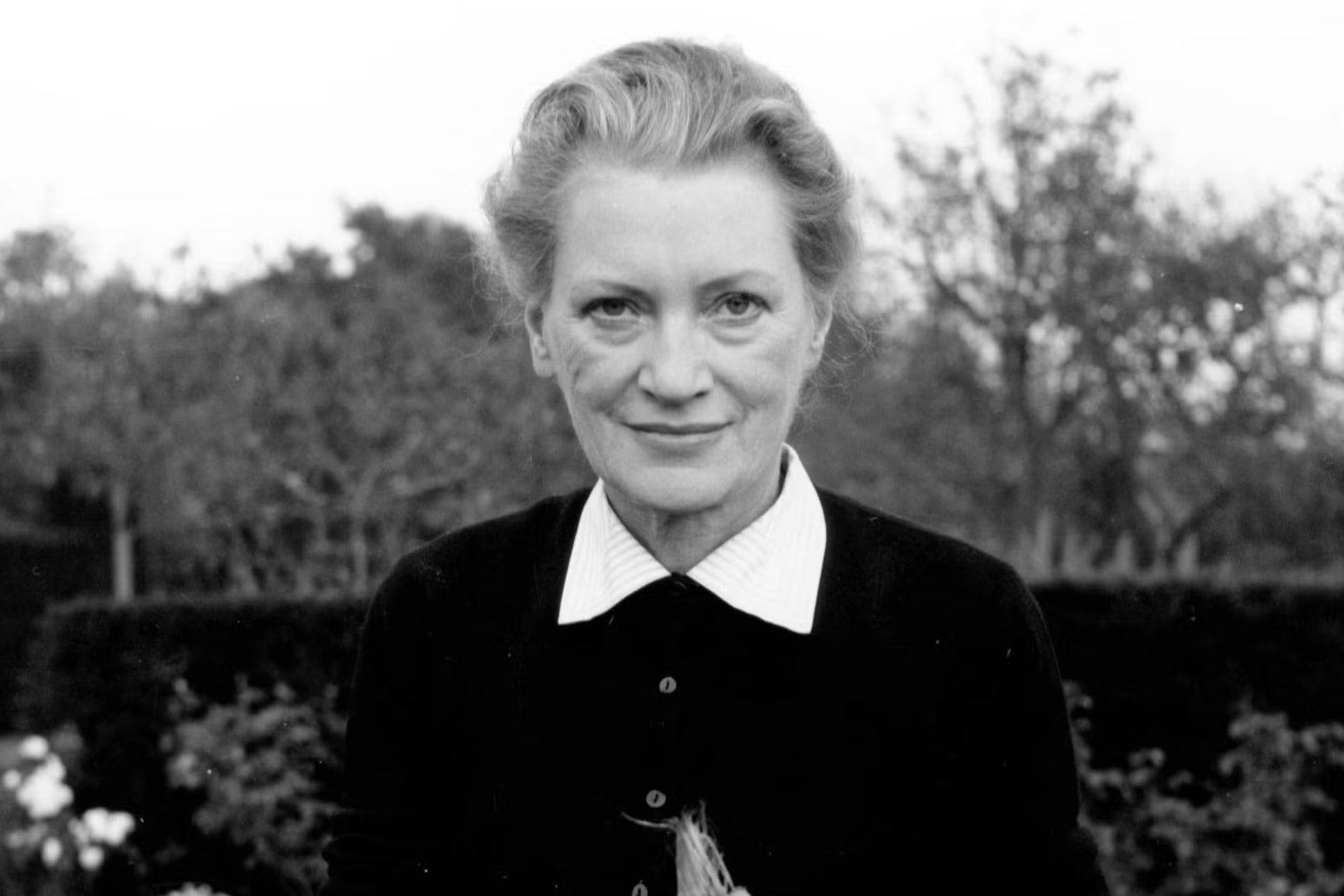 Lee Miller dehusking corn in the garden of Farleys House, East Sussex, circa 1960. Cooking became a creative outlet for Miller after the horrors of the Second World War