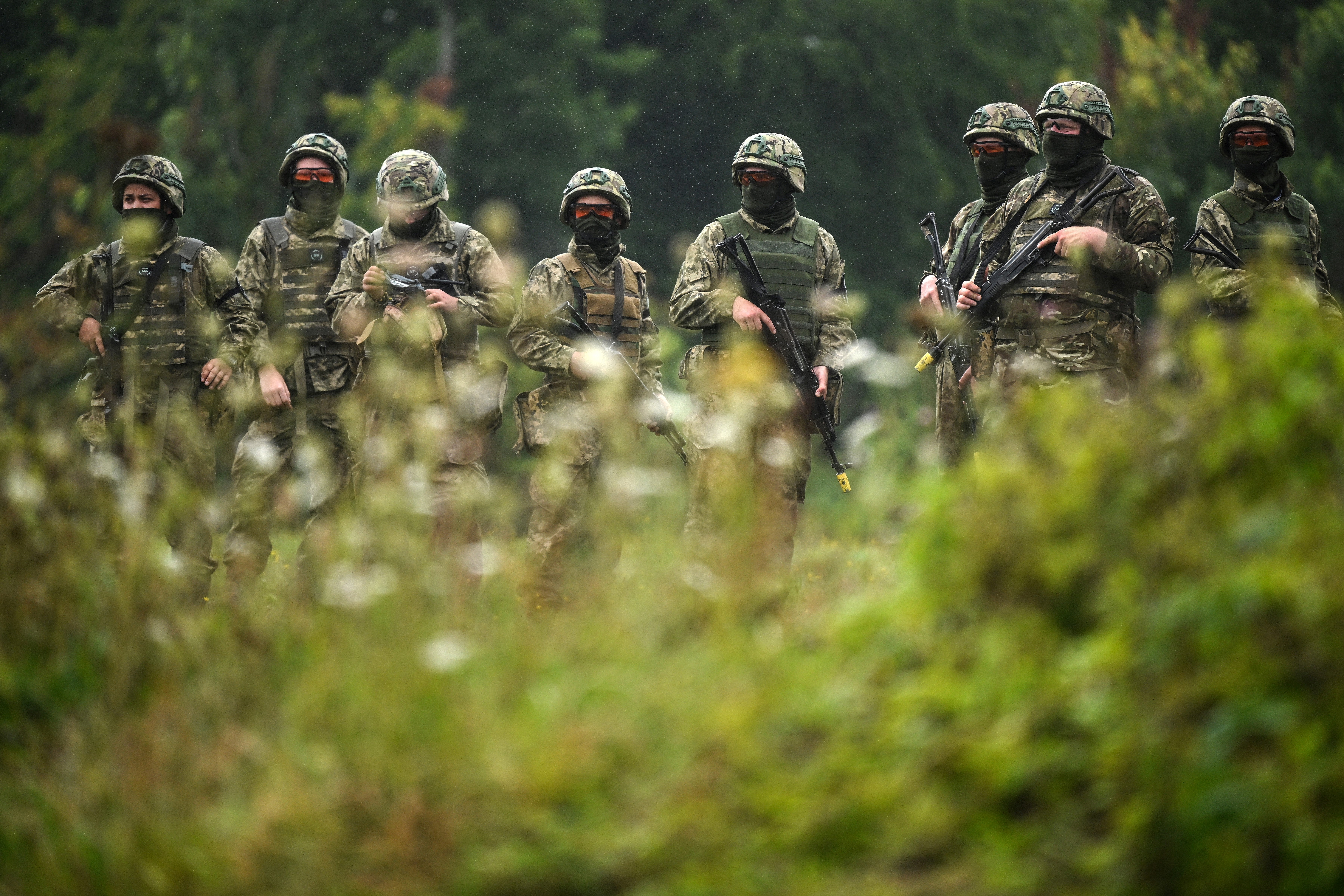 Ukrainian soldiers take part in a casualty simulation training excercise operated by Britain's armed forces