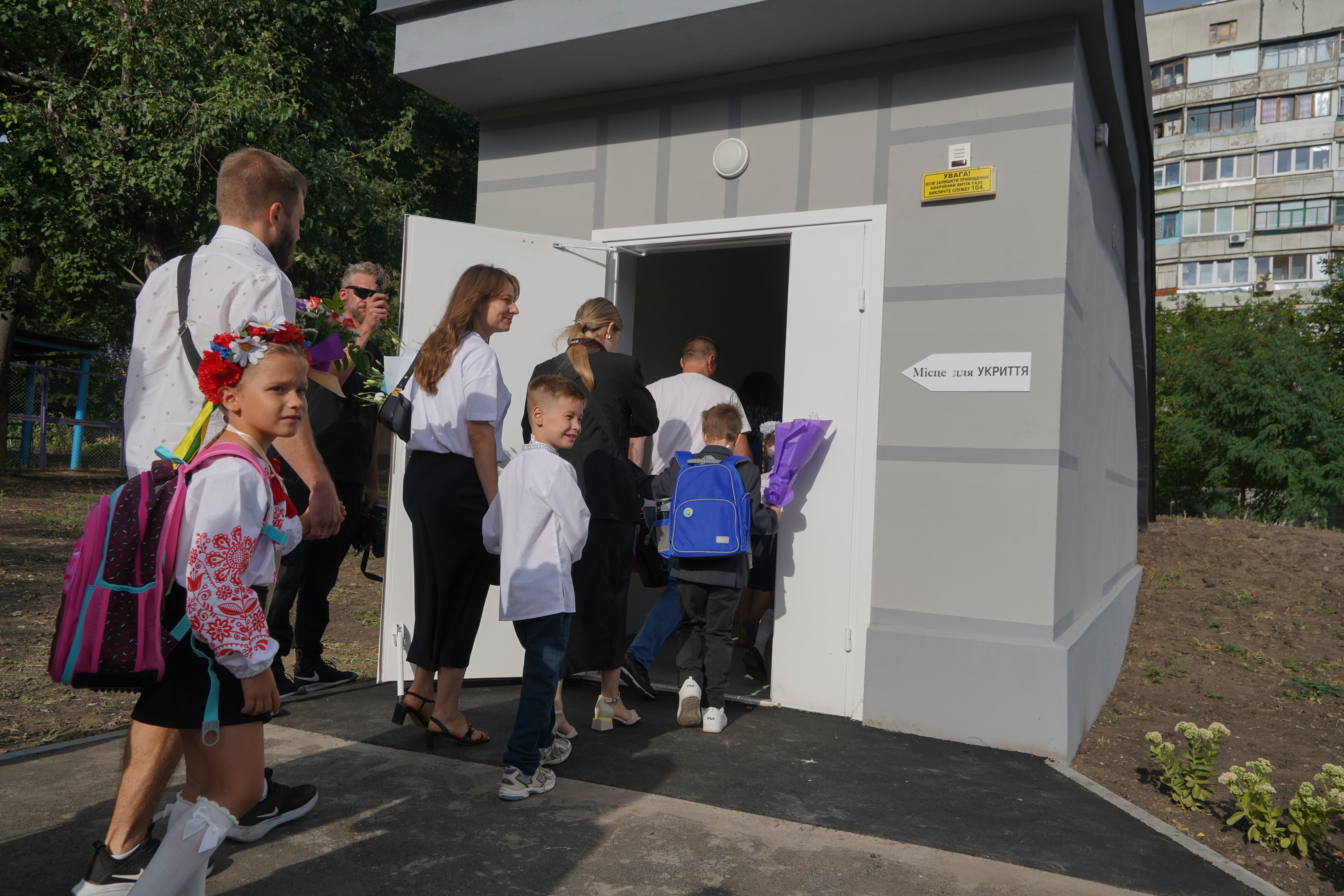 Housed in an administrative building never designed for teaching, the makeshift underground school features narrow classrooms, often separated only by sheets of heavy plastic