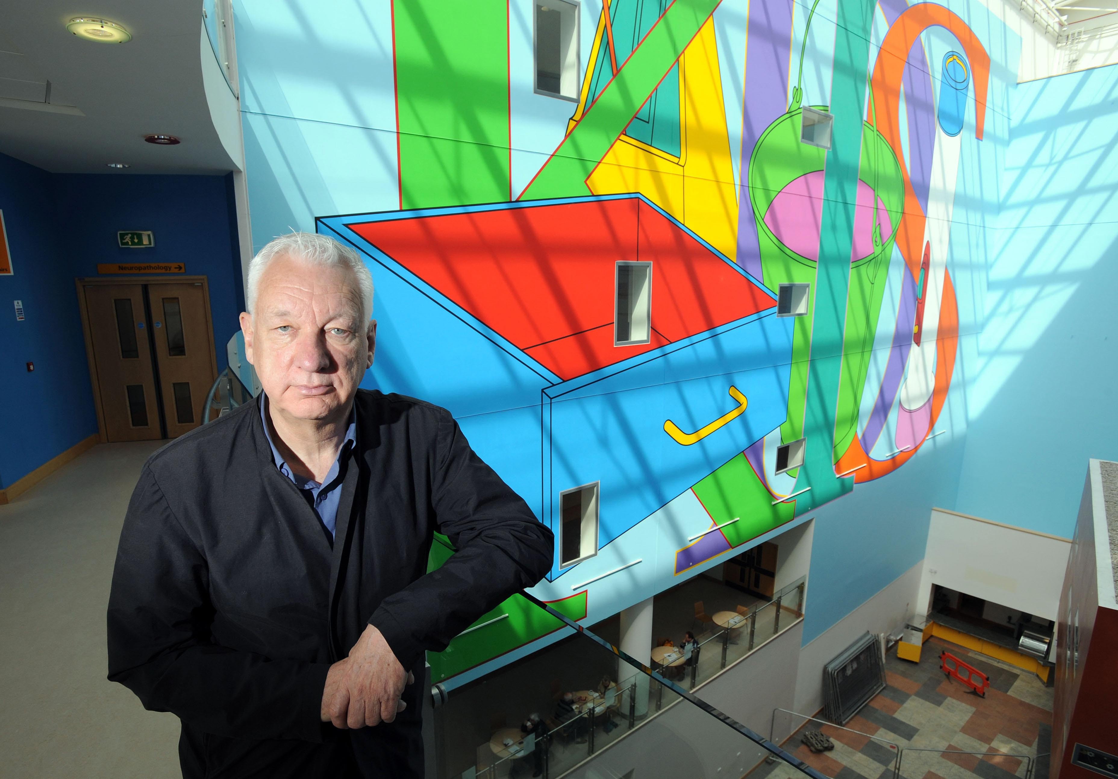 Craig-Martin with his five-storey wall painting unveiled at the John Radcliffe Children's Hospital in Oxford