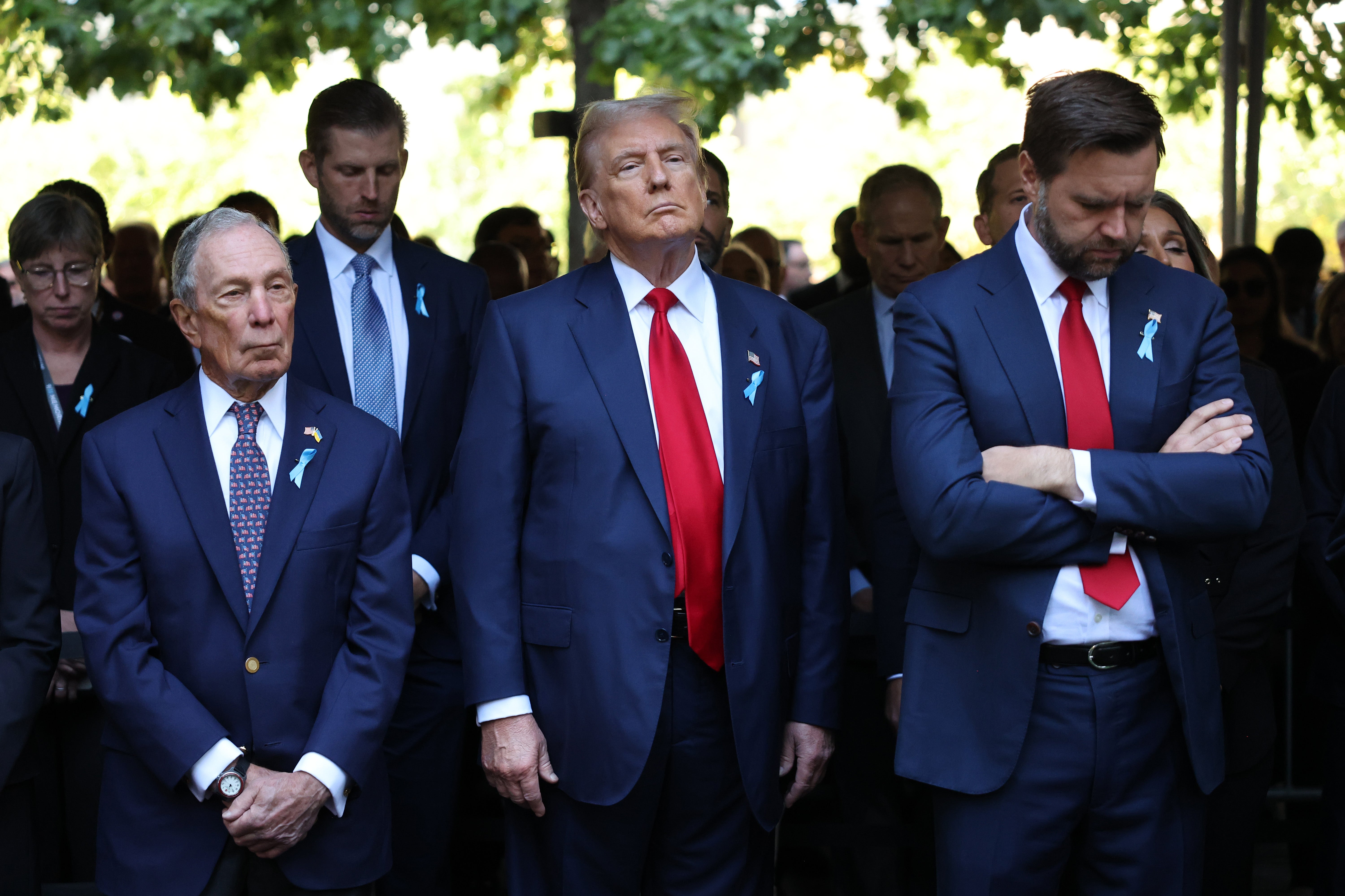 The former president gazed up at the sky as others bowed their heads at Ground Zero