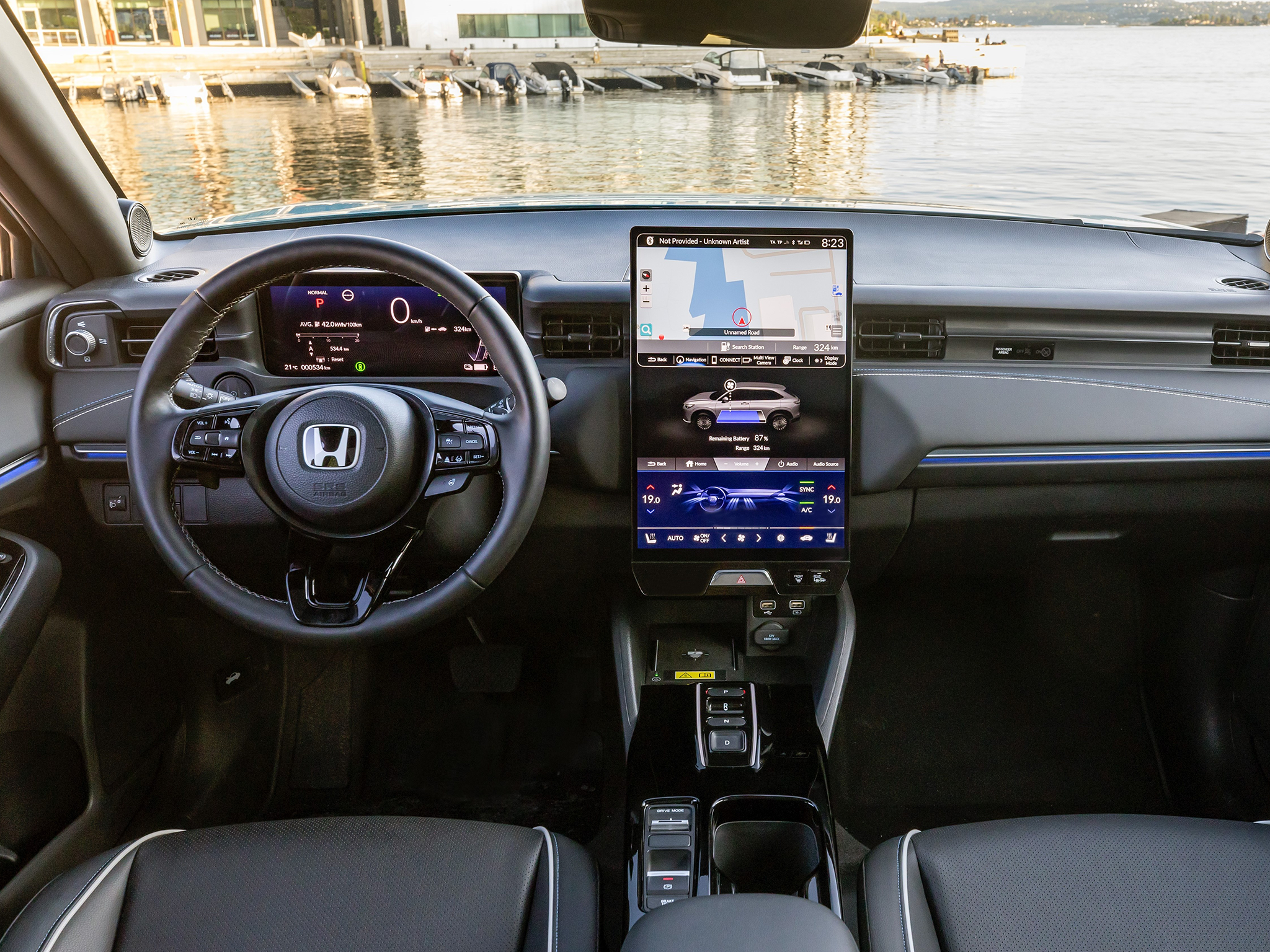 Inside, the Honda e:Ny1 features a large 15.1-inch portrait infotainment screen and a digital driver’s display.