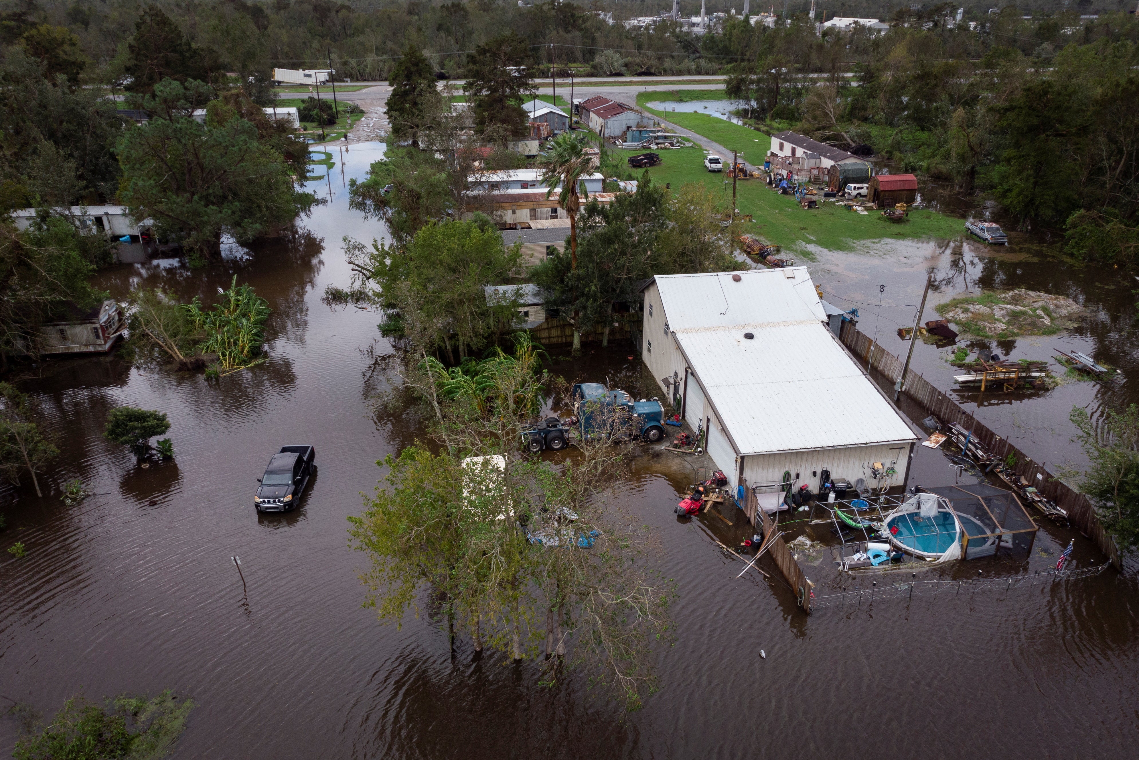 An aerial view of a flooded trailer park in Patterson, Louisiana, on Thursday. Flooding is still possible elsewhere in the Gulf Coast on Thursday. Francine is expected to weaken more later in the day.