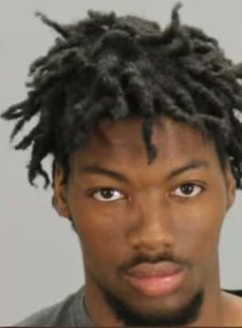 Murder suspect Matt Washington Jr. was found pretending to be asleep when police arrived at his home, according to a report