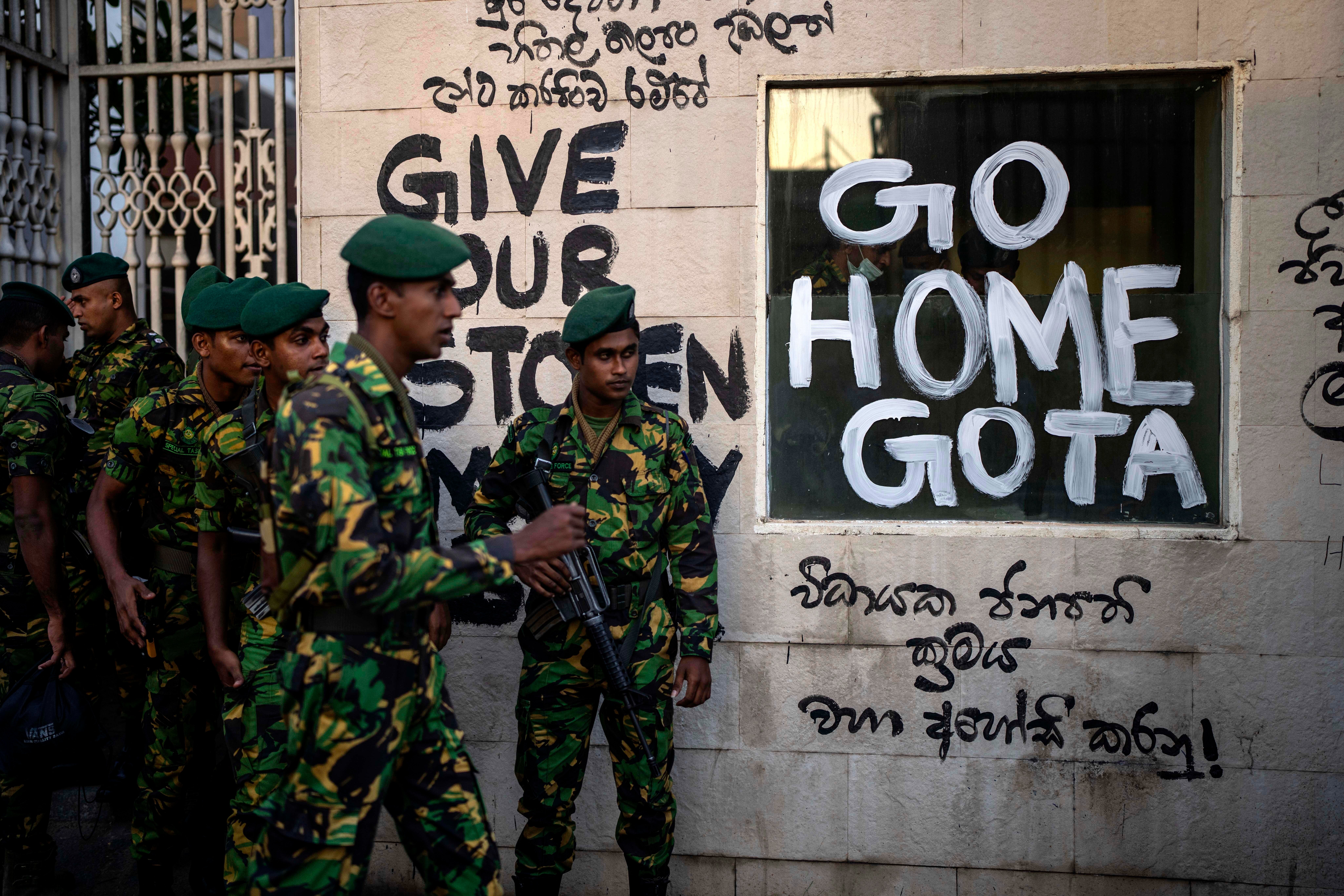 Sri Lanka army soldiers patrol near the official residence of president Gotabaya Rajapaksa three days after it was stormed by anti-government protestors in Colombo