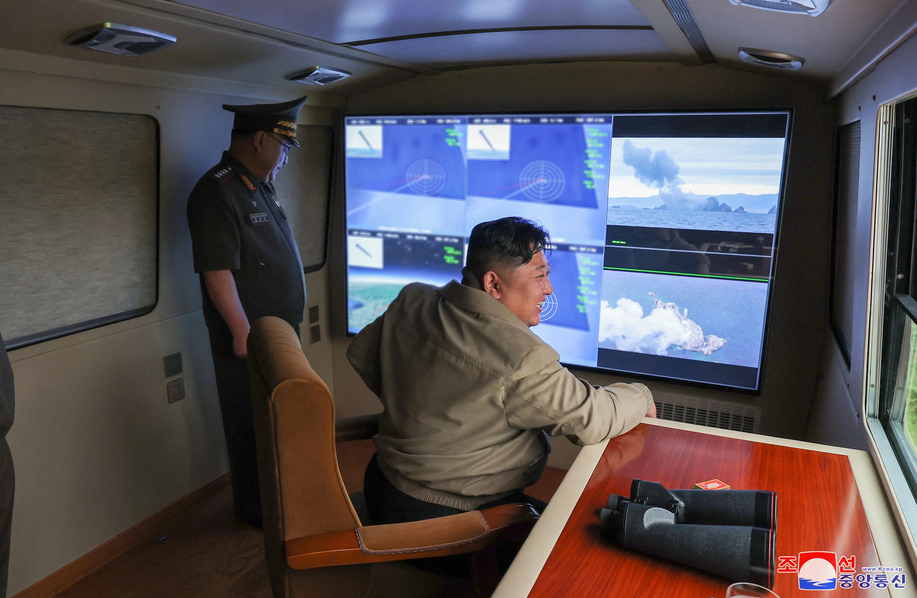 Kim Jong-un inspects a missile test firing range at an undisclosed location in North Korea