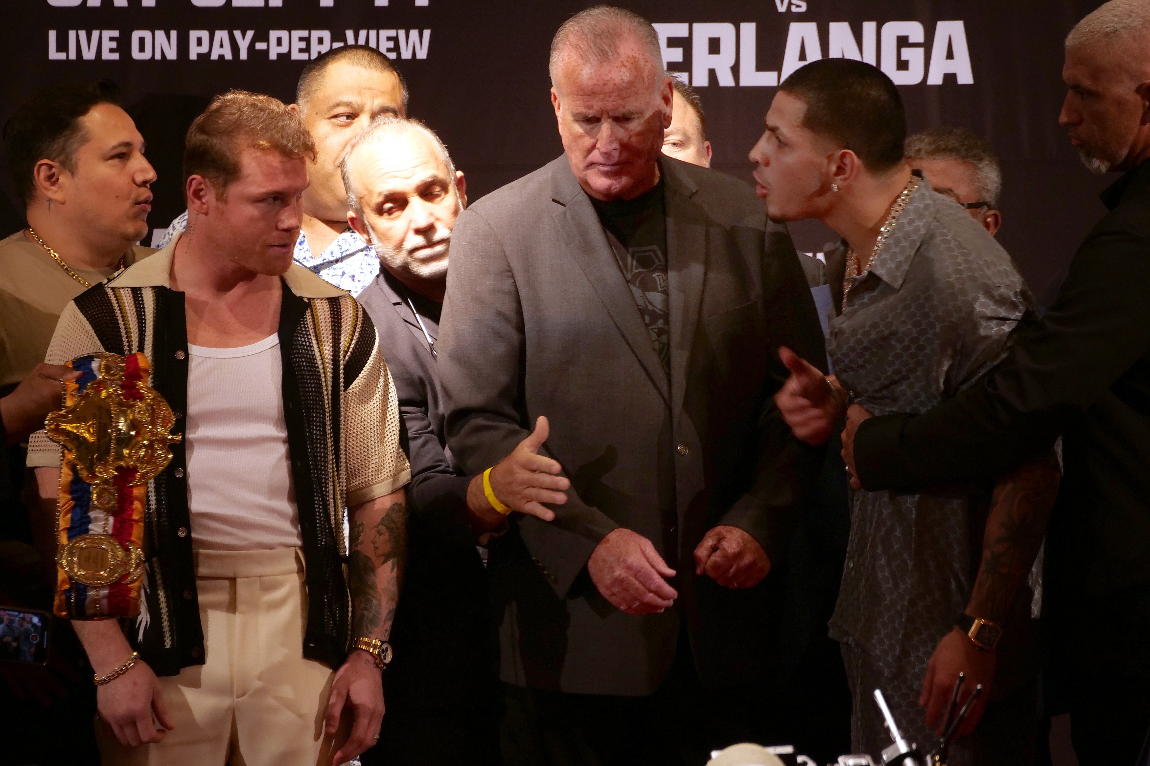 Canelo (left) and Edgar Berlanga at a pre-fight press conference in August