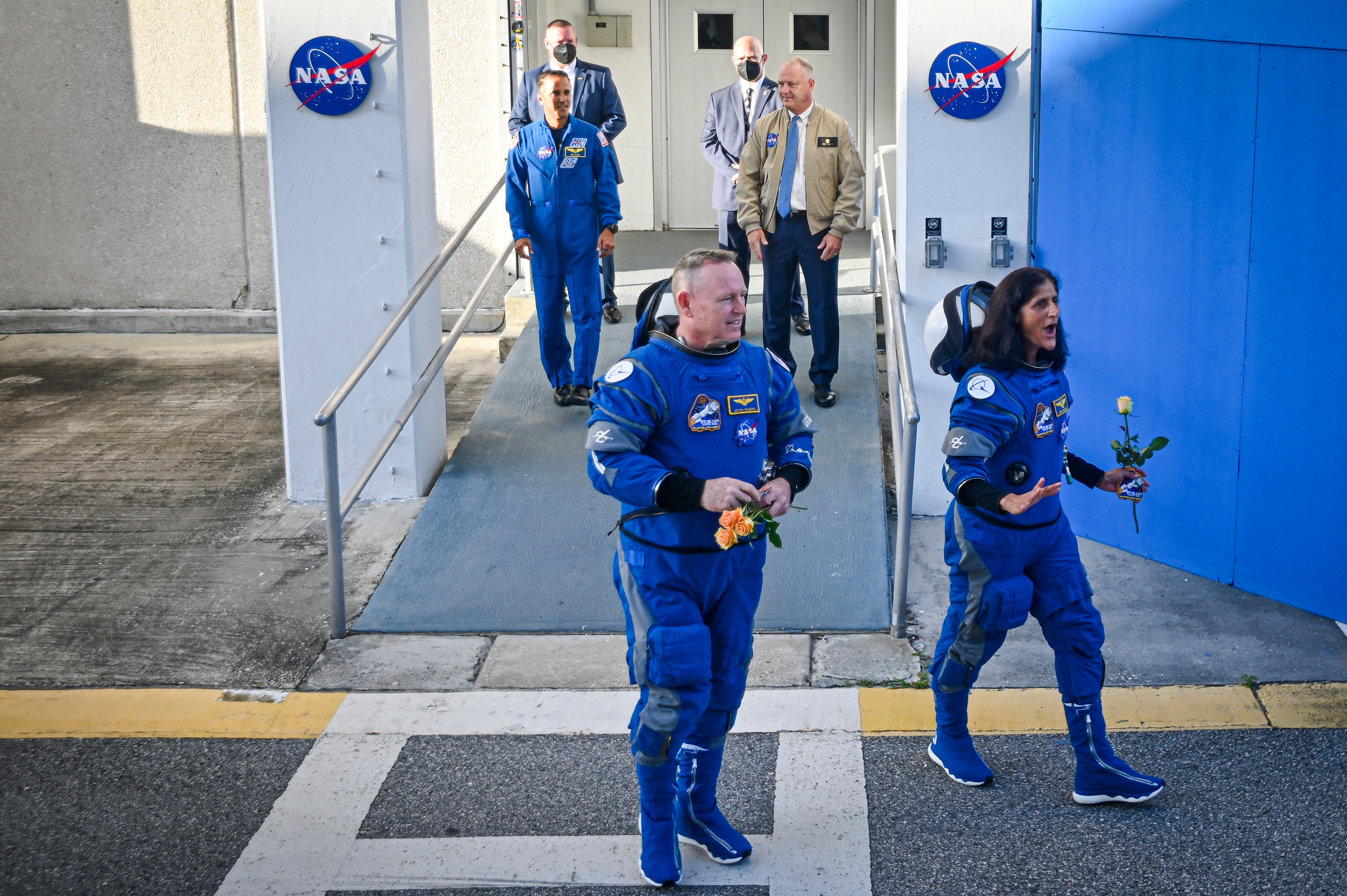 Nasa astronauts Wilmore and Williams depart the Neil A Armstrong Building at Kennedy Space Center in Florida to board the Boeing CST-100 Starliner spacecraft