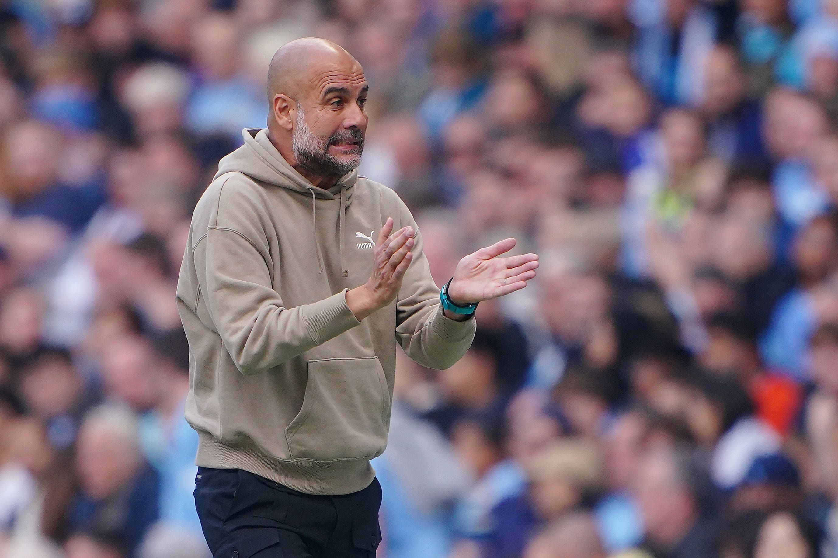 Manchester City manager Pep Guardiola gestures on the touchline against Ipswich (Peter Byrne/PA)