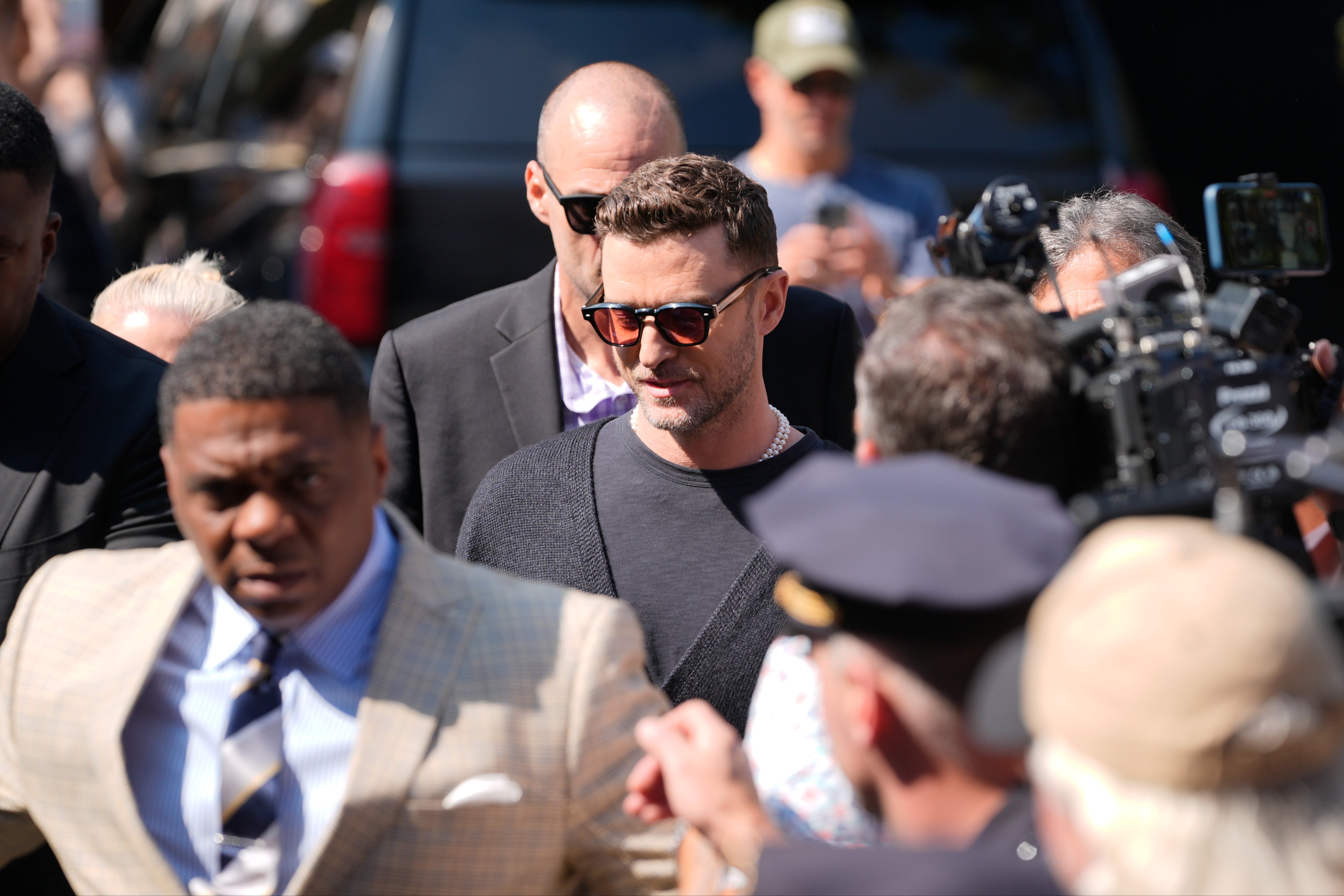 Justin Timberlake was mobbed by fans as he entered Sag Harbor Village Court with a police escort