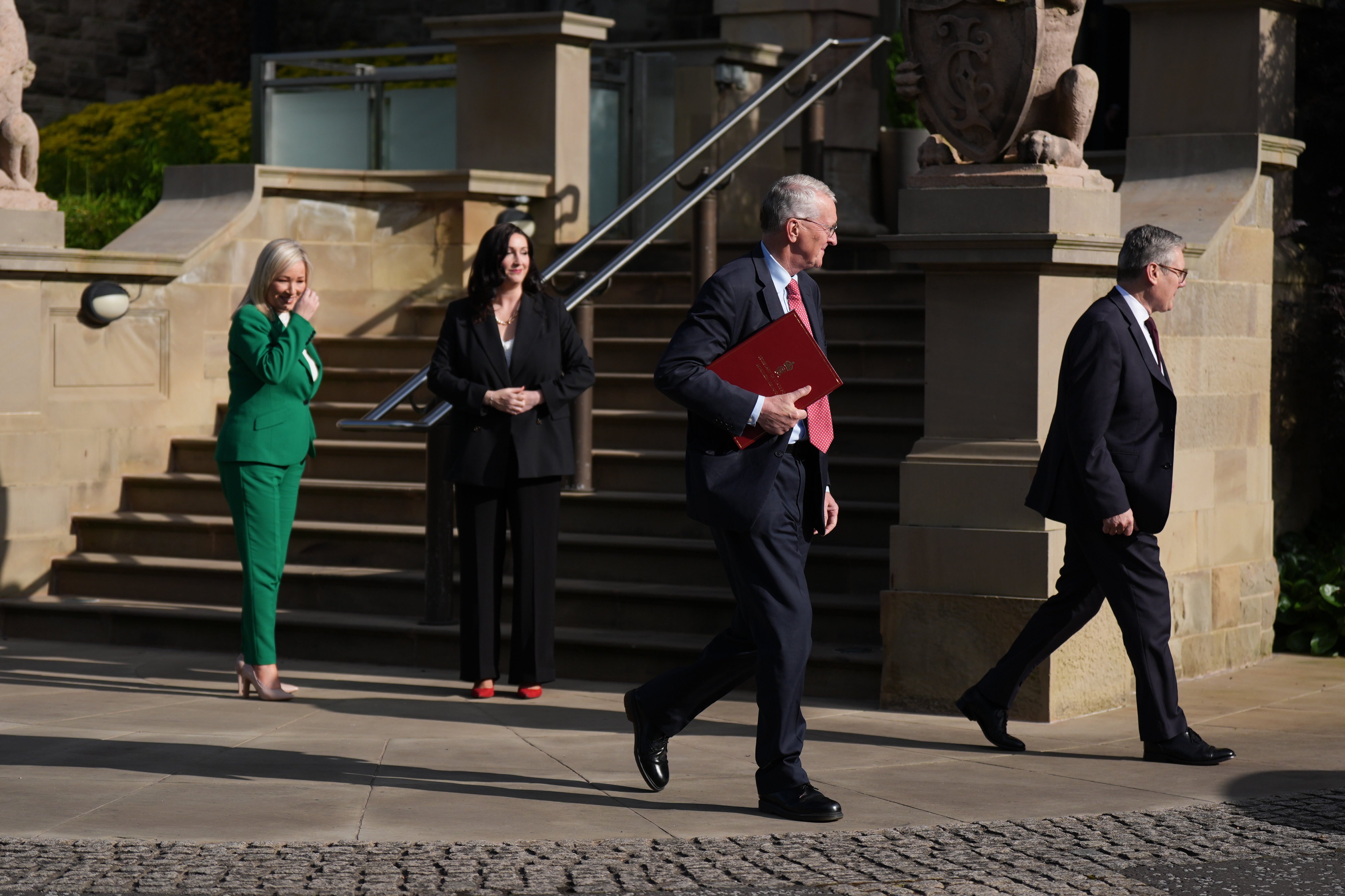 Prime Minister Sir Keir Starmer and Northern Ireland Secretary Hilary Benn leaving after meeting First Minister Michelle O’Neill and deputy First Minister Emma Little-Pengelly at Stormont Caste, during the PM’s tour of the UK following Labour’s victory in the 2024 General Election. Picture date: Monday July 8, 2024.