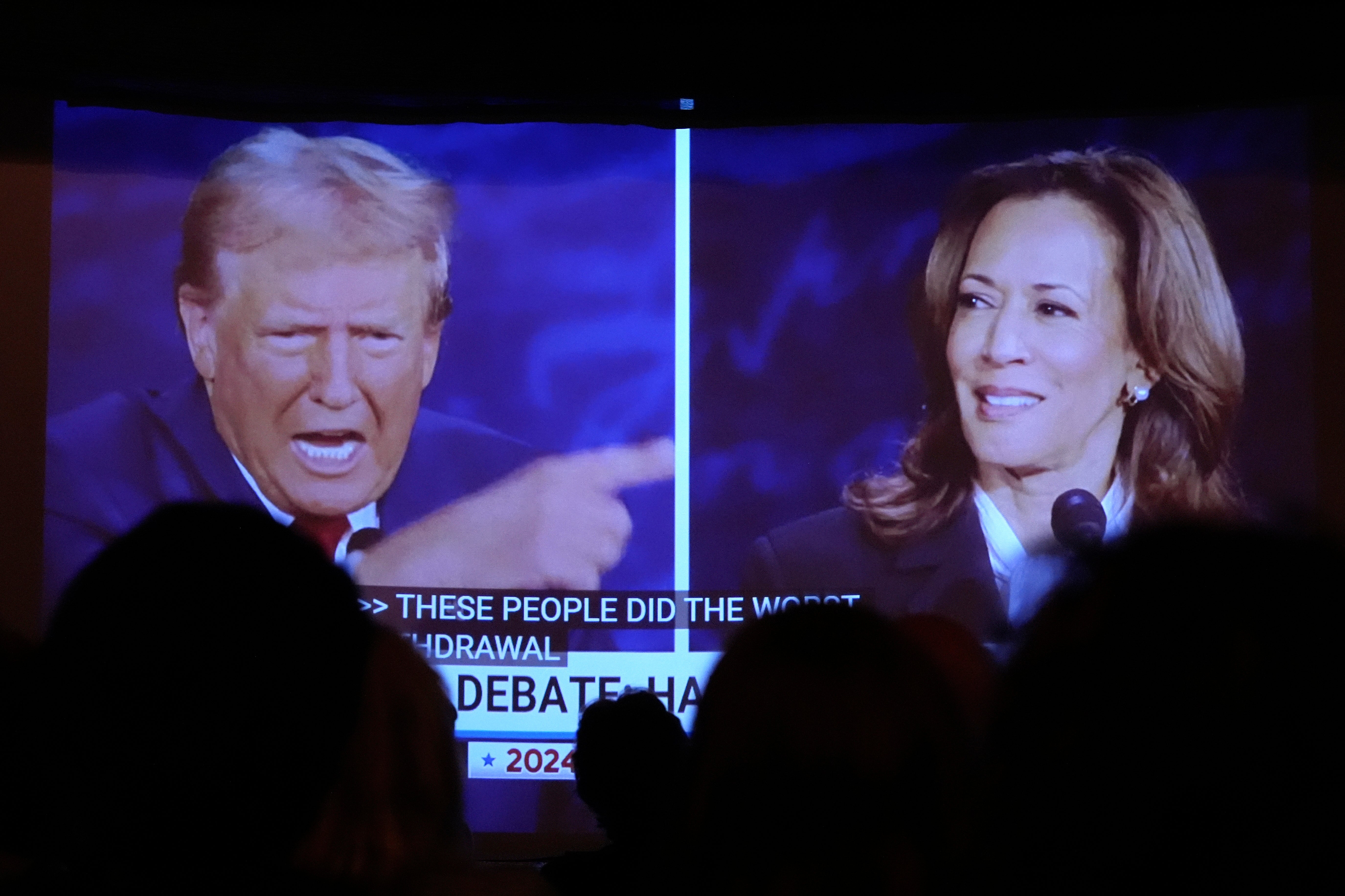 Slight of hand? Donald Trump points at US presidential debate rival Kamala Harris