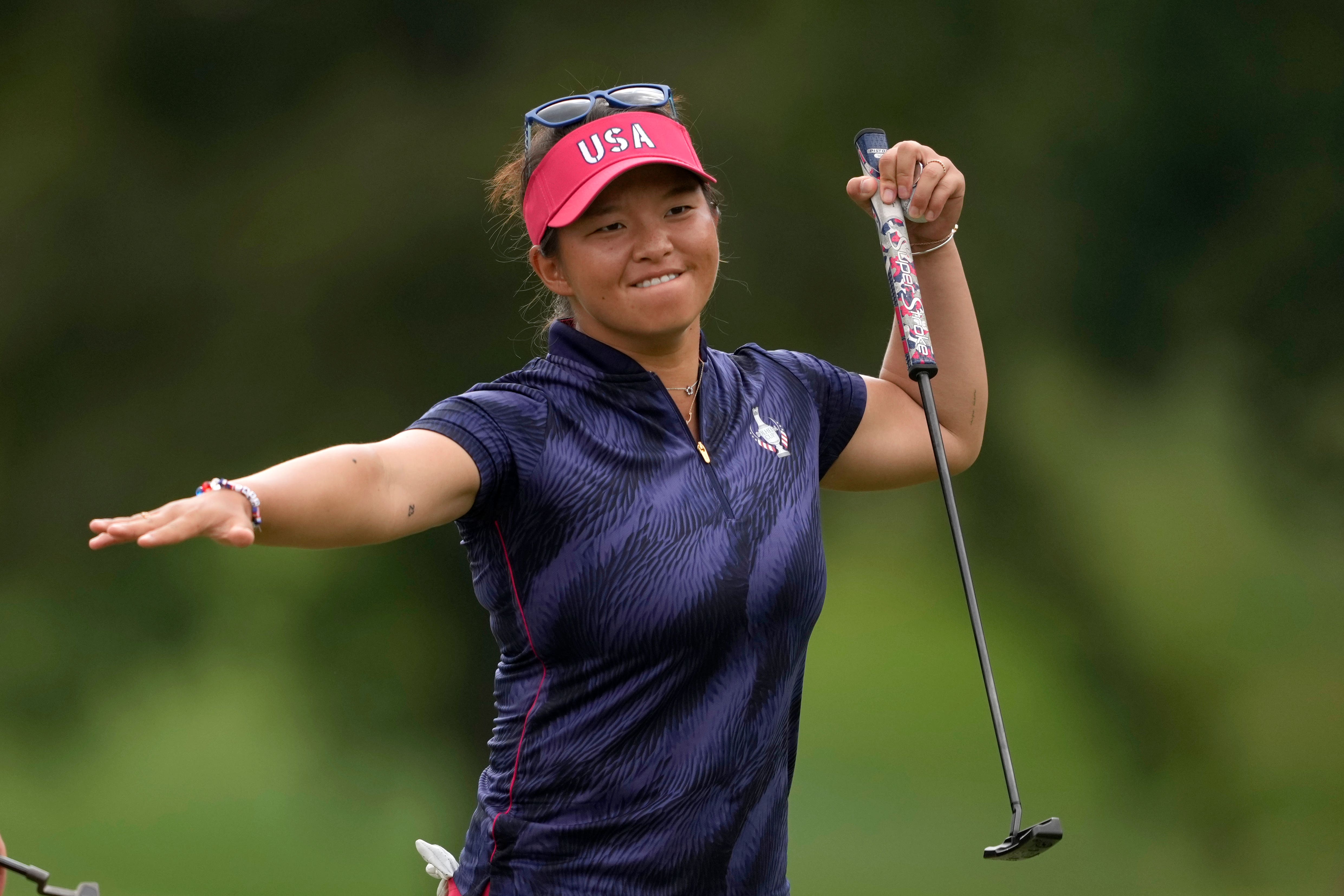 Megan Khang celebrates as the United States took control on the opening day of the Solheim Cup against Europe (Matt York/AP)